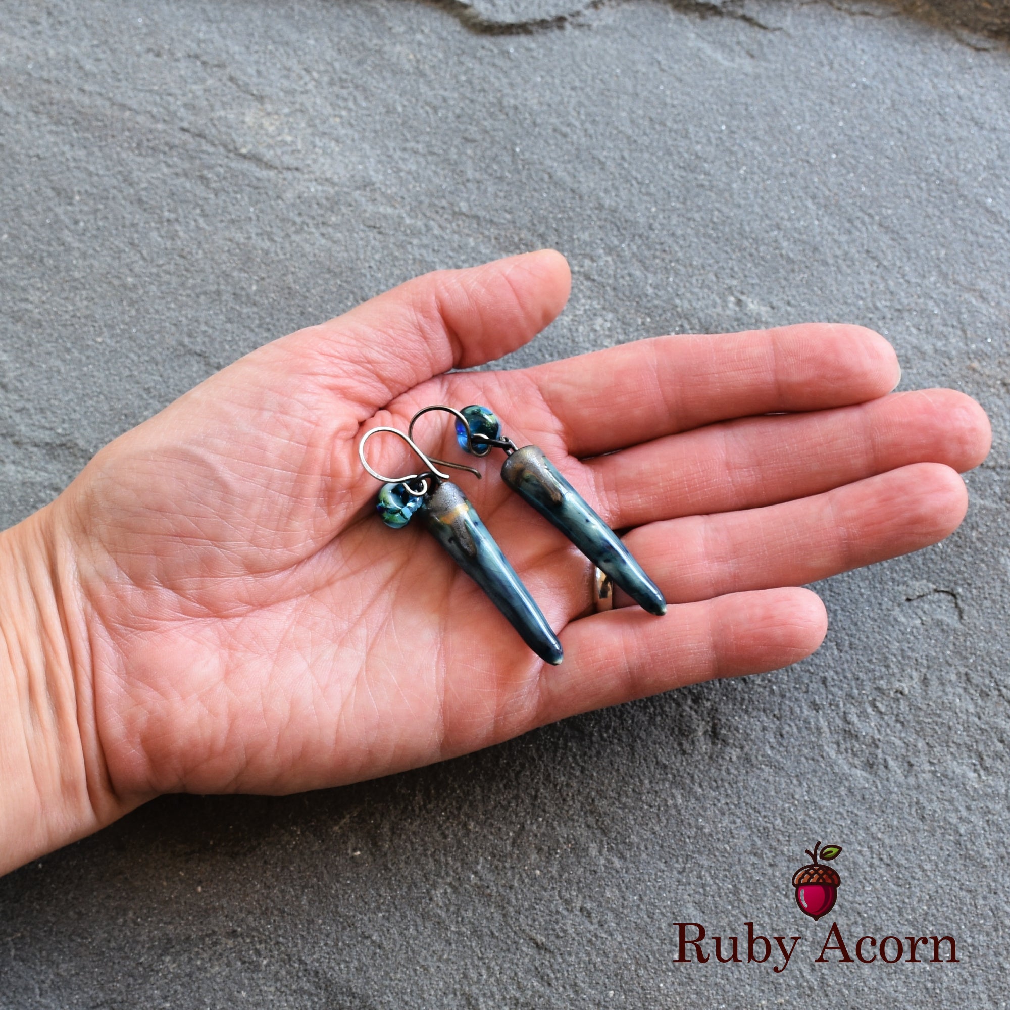 The jewelry in the image is a pair of earrings.