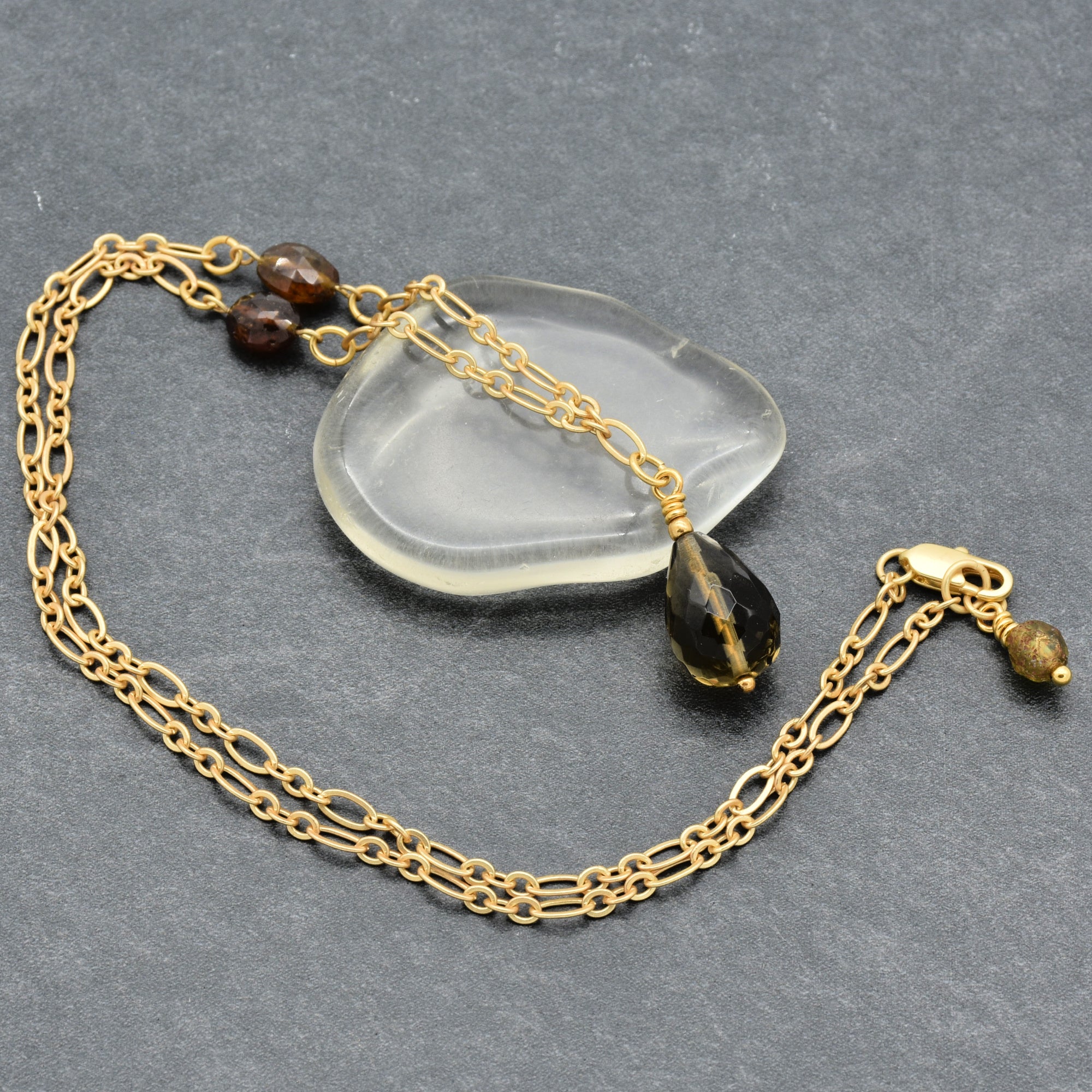 This image shows a bracelet. The size and the clasp style, along with the shorter chain length, indicate it is designed to be worn around the wrist.