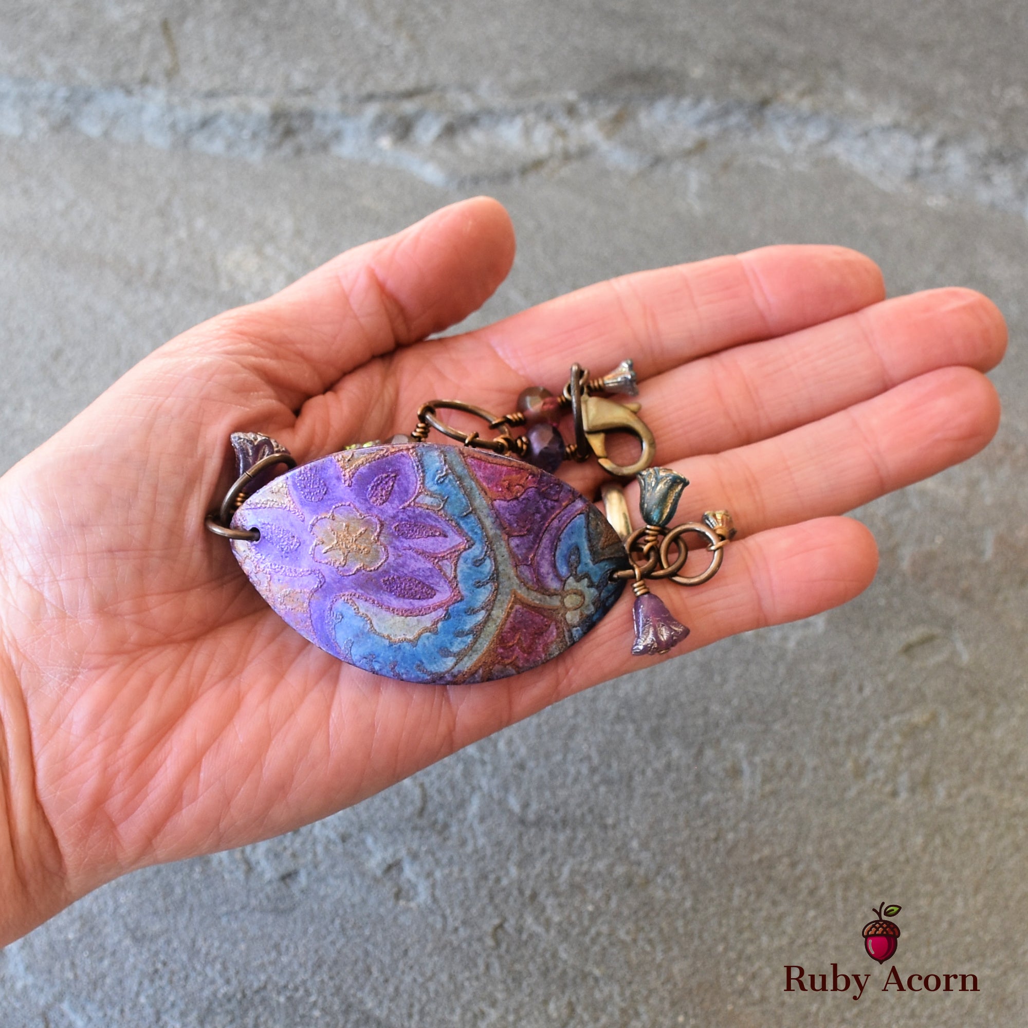 This image shows a bracelet. The jewelry piece is relatively short in length and has a clasp that is typical of bracelets. It also features decorative elements and beads consistent with bracelet designs.