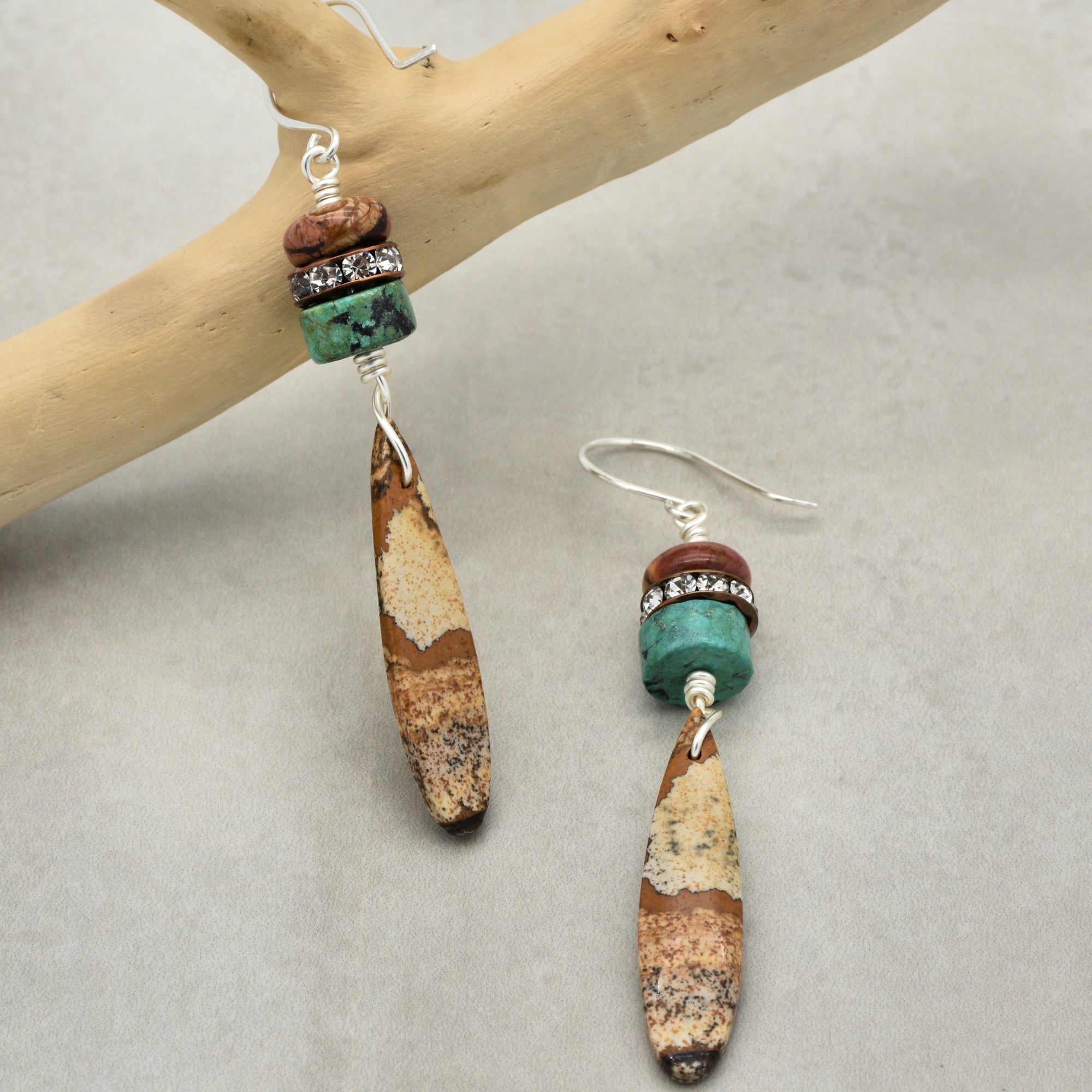 The image shows a pair of earrings.