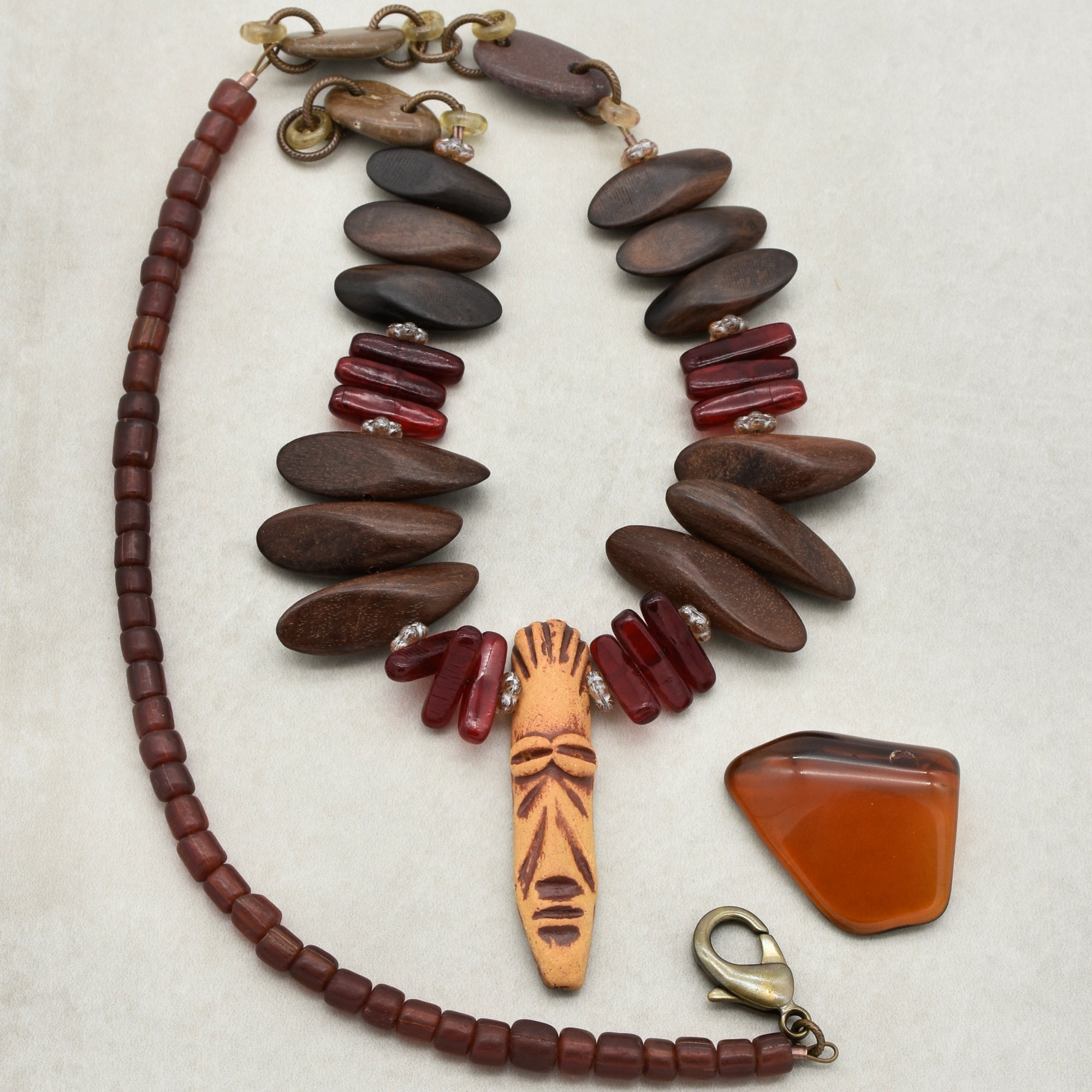 This image shows a bracelet. The size and the design of the beads along with the clasp type suggest it is meant to be worn around the wrist rather than around the neck or on the ears.