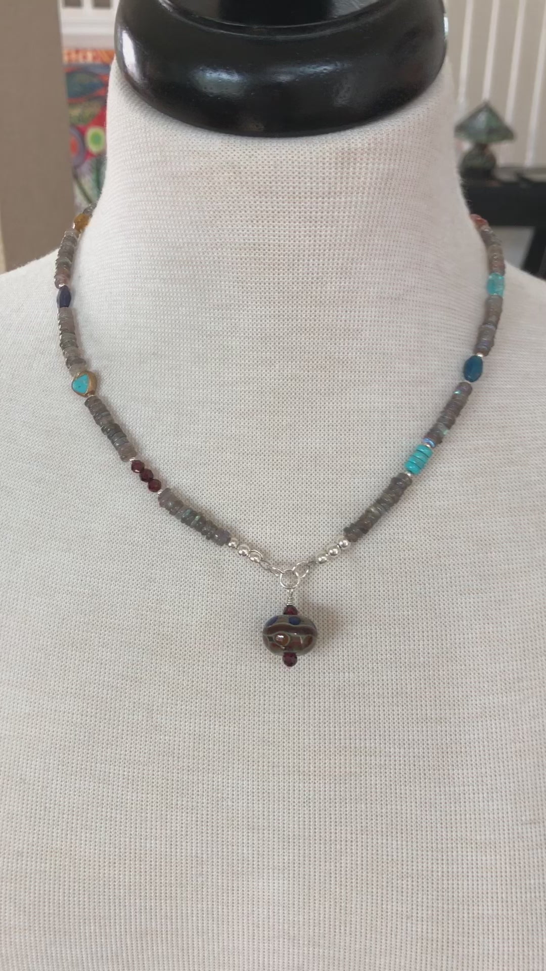 Video of mannequin bust wearing Athena necklace