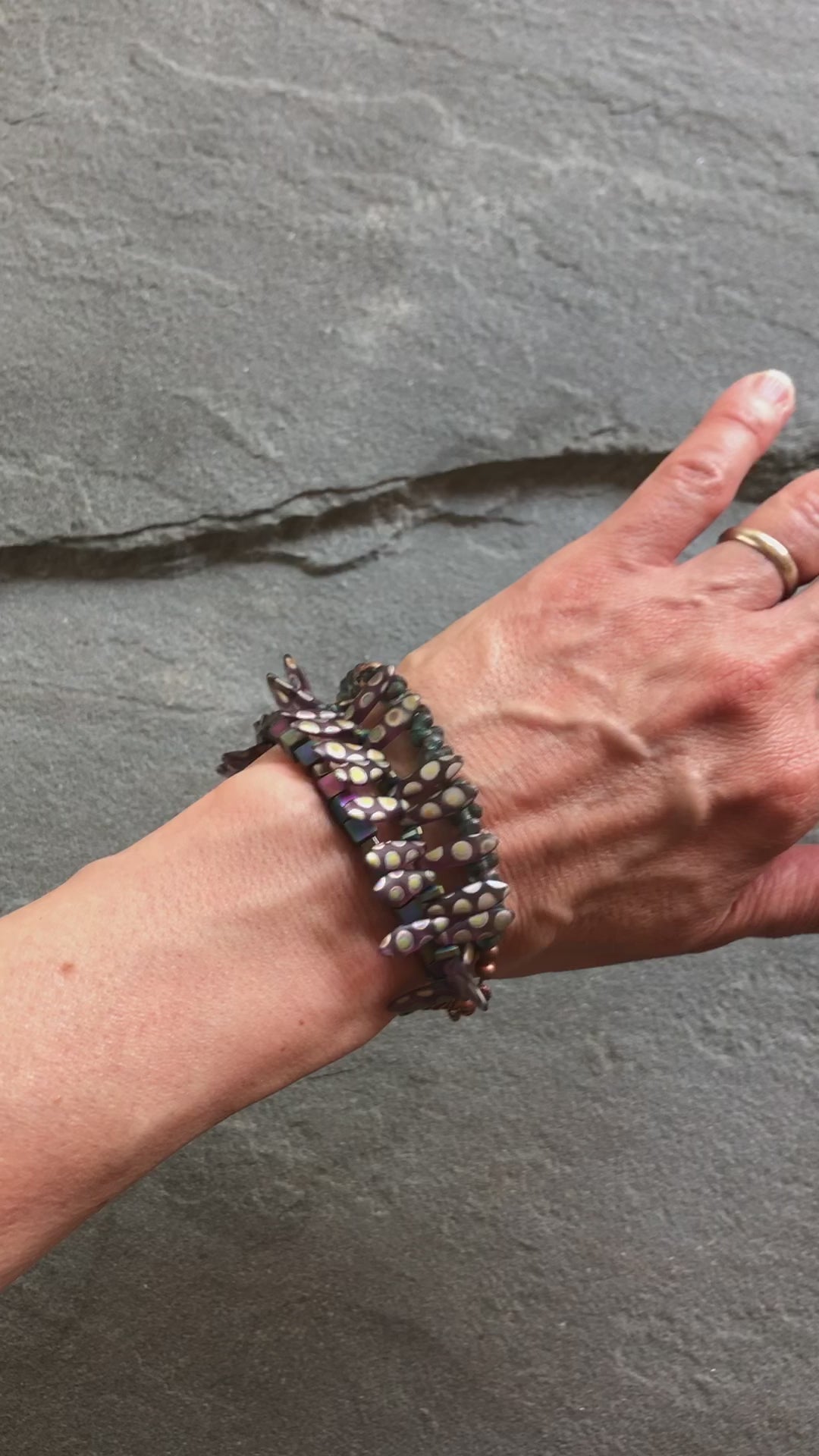 Video of hand wearing Dragonfly Wings triple strand bracelet