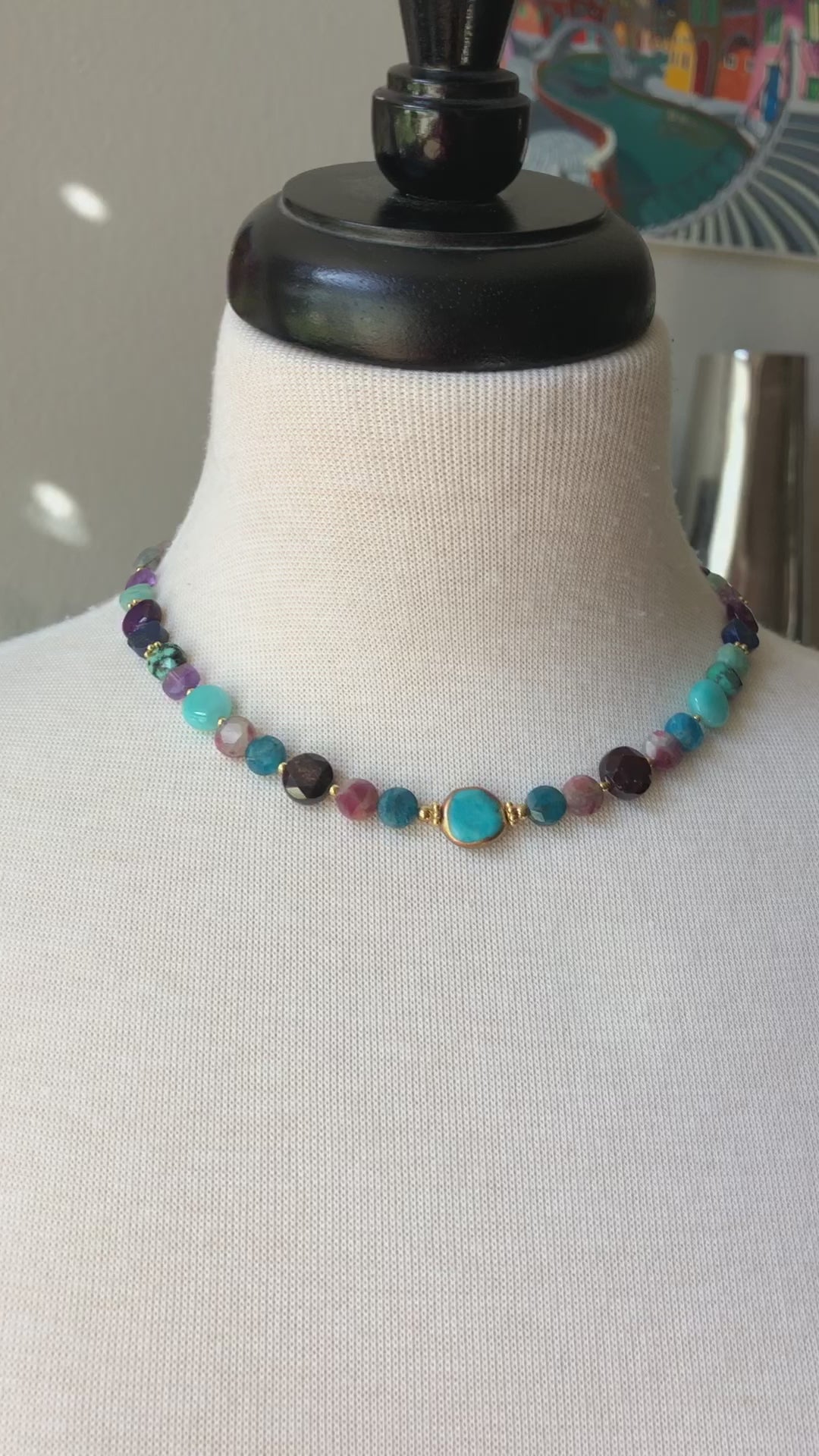 Video of mannequin bust wearing Jewels necklace