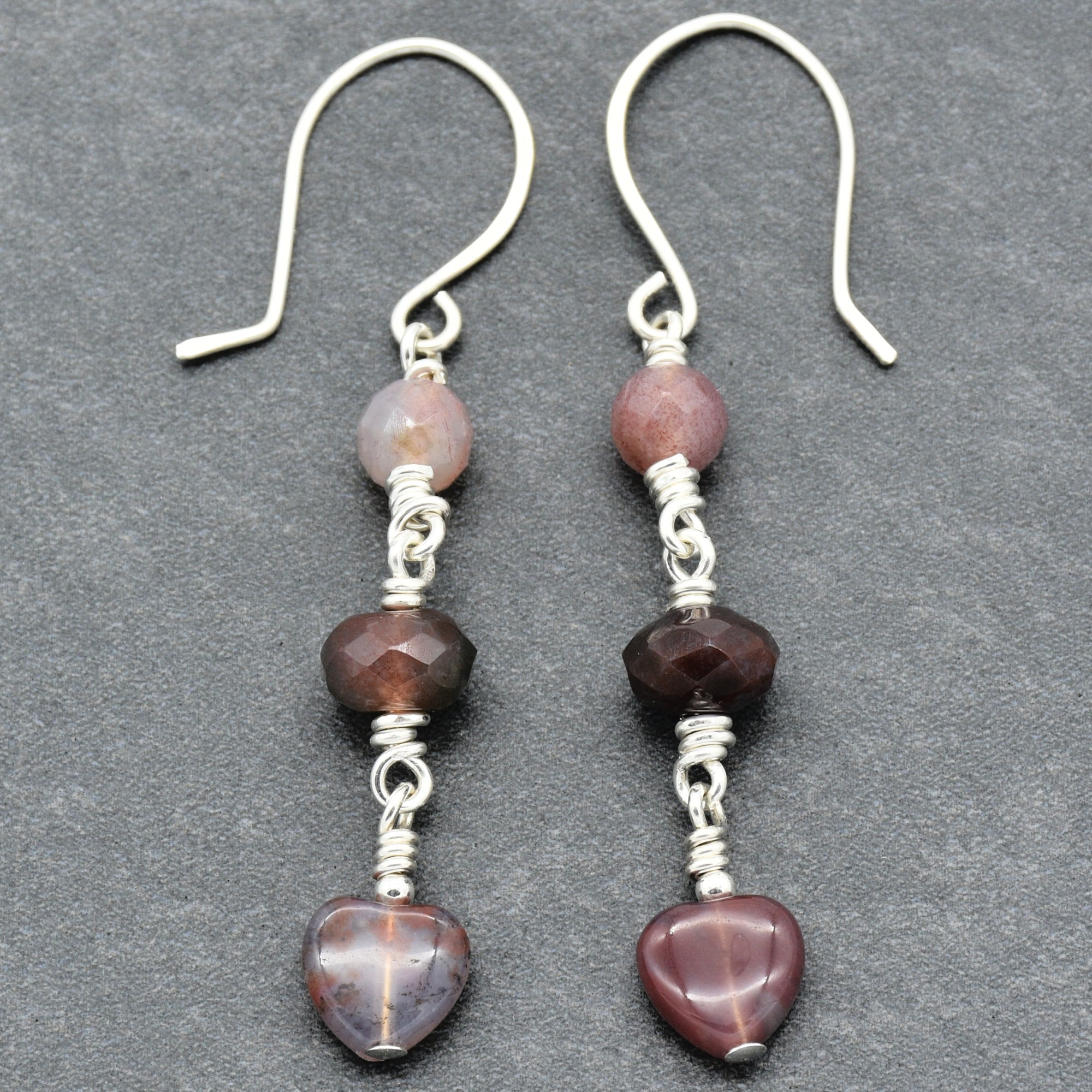 The image shows a pair of earrings.