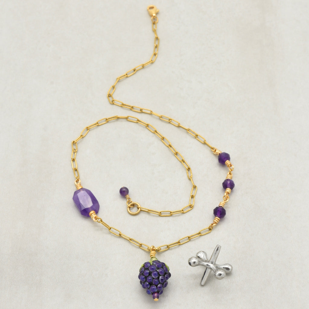 Asymmetrical gold chain necklace with artisan lampwork glass blackberry focal and amethyst on a light background - handmade with love by Ruby Acorn