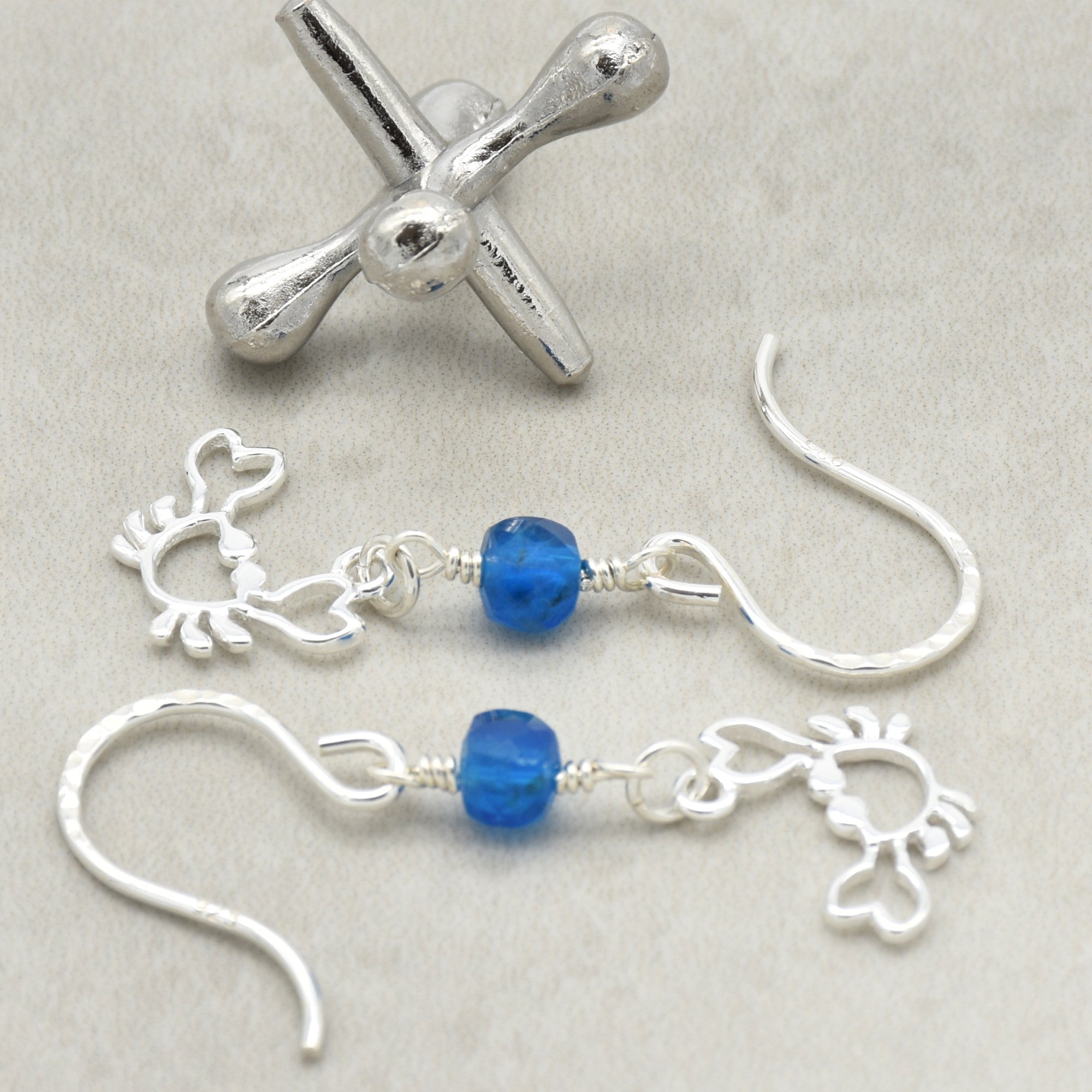 Sterling silver dangle earrings with crab charms, apatite, and silver ear wires on a light surface - handmade with love by Ruby Acorn