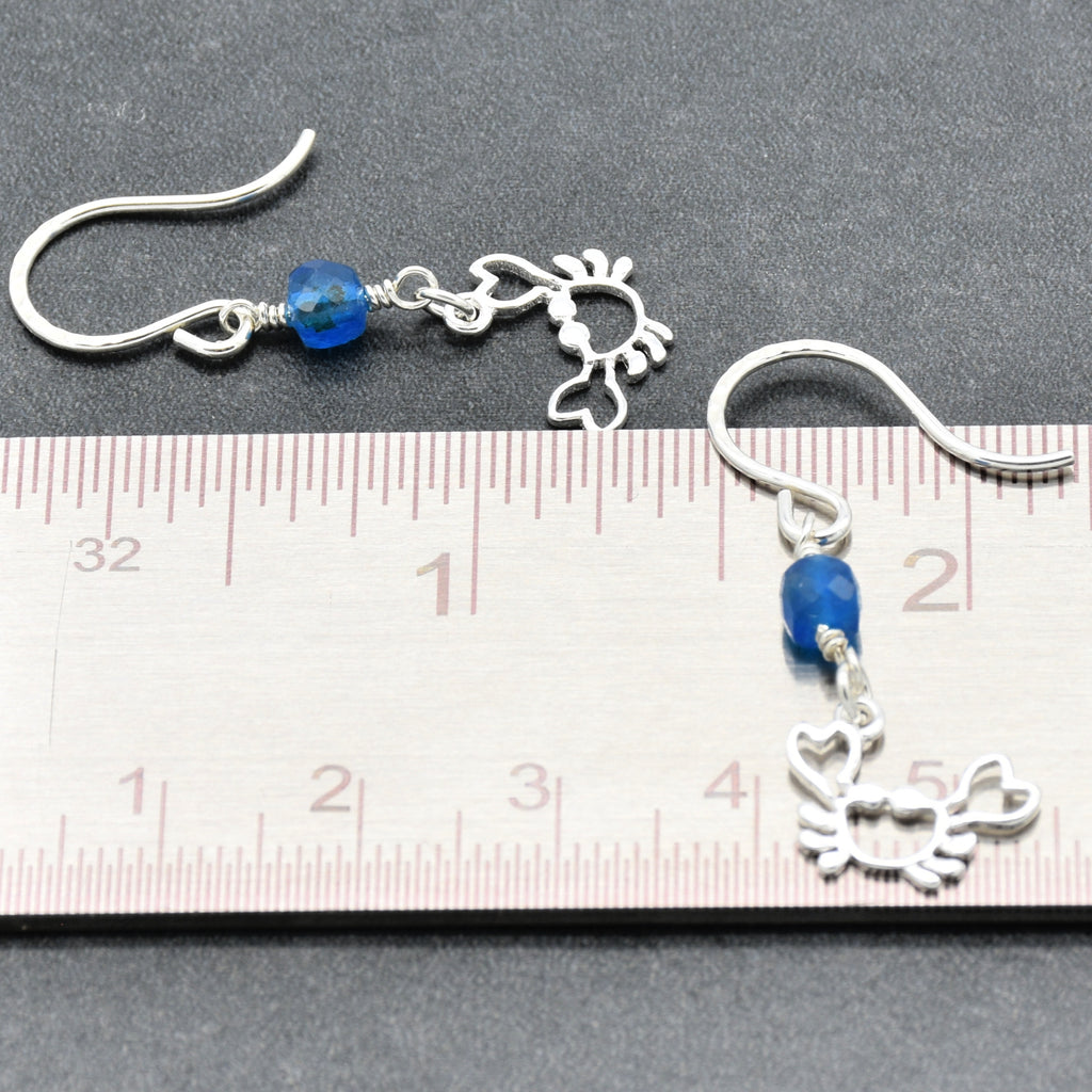 Sterling silver dangle earrings with crab charms, apatite, and silver ear wires beside a ruler for scale - handmade with love by Ruby Acorn