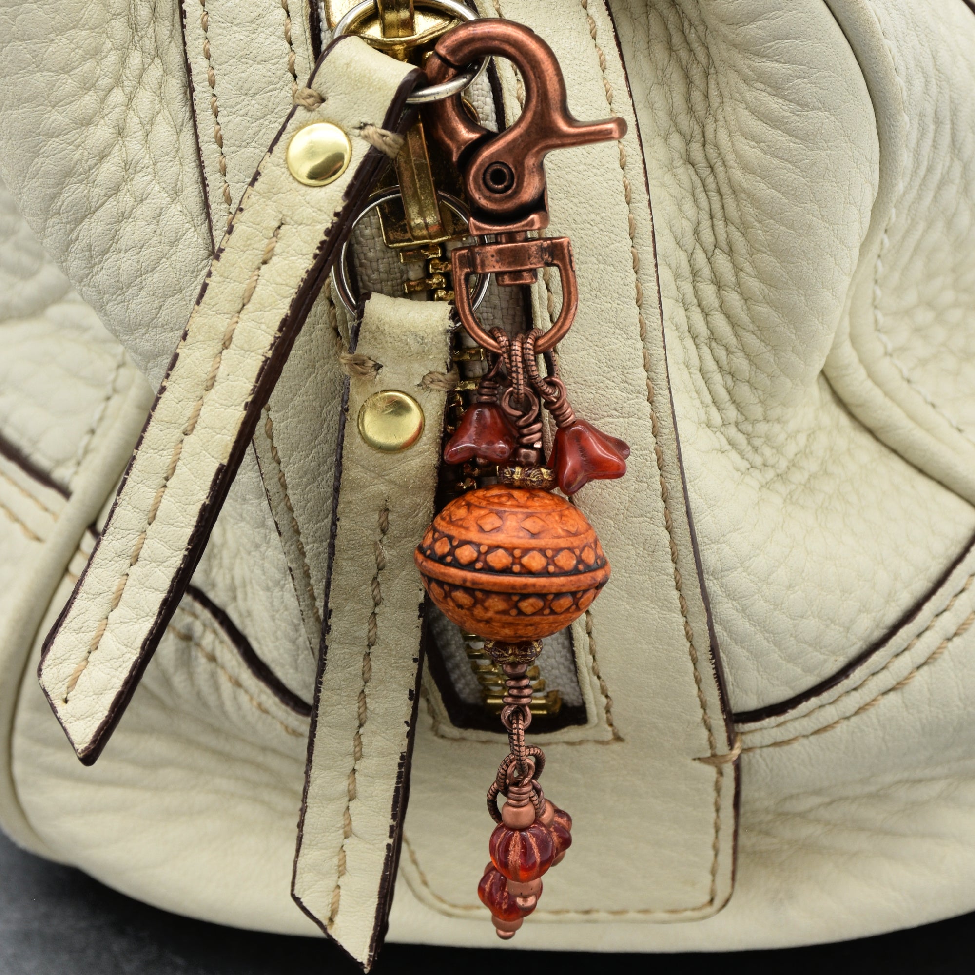 Chili Pepper red handbag charm with colorful charms and copper swivel lobster claw on a cream purse - handmade with love by Ruby Acorn
