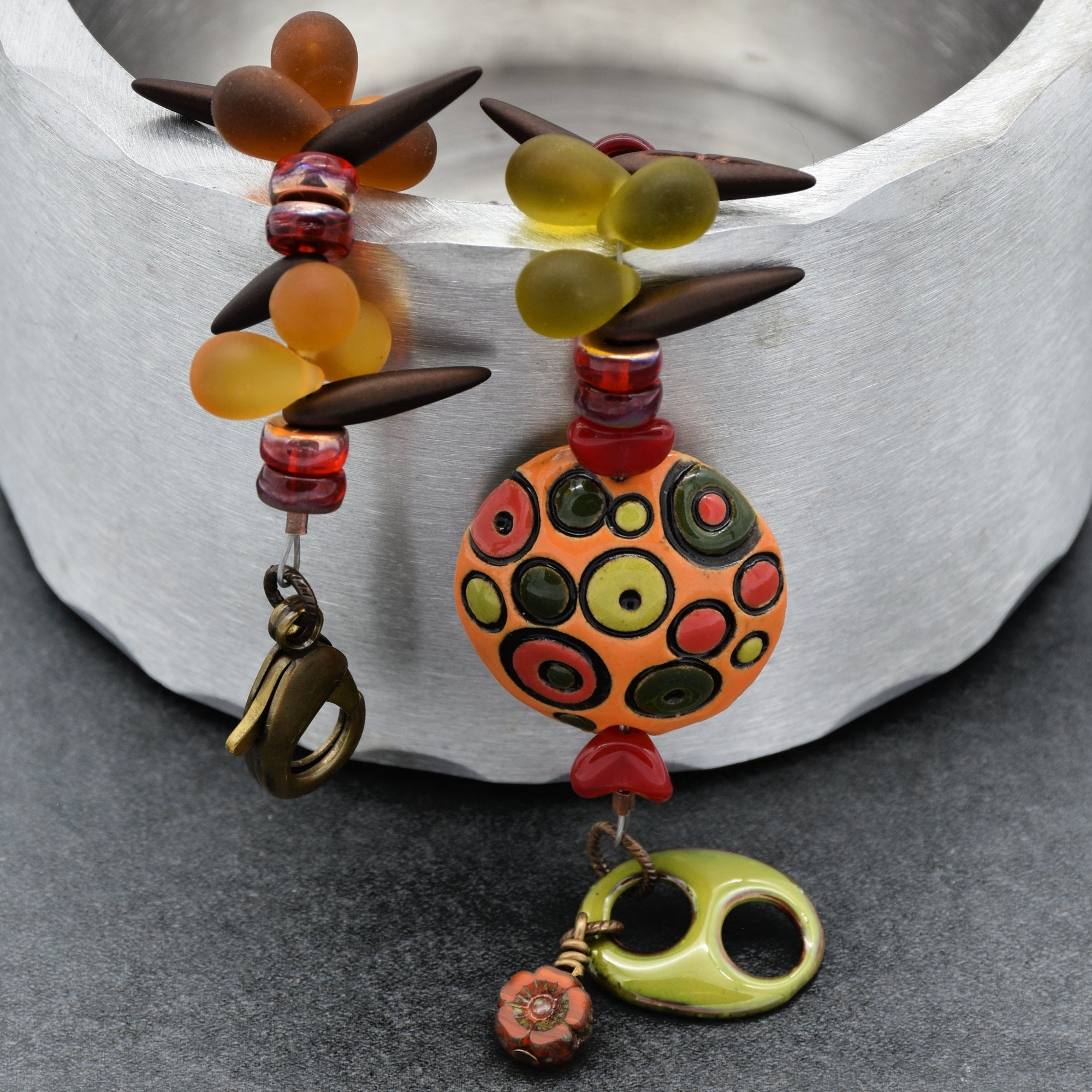 Circles and Spikes Handmade Beaded Bracelet with Artisan Ceramic Focal, Artisan Enameled Link and Czech Glass