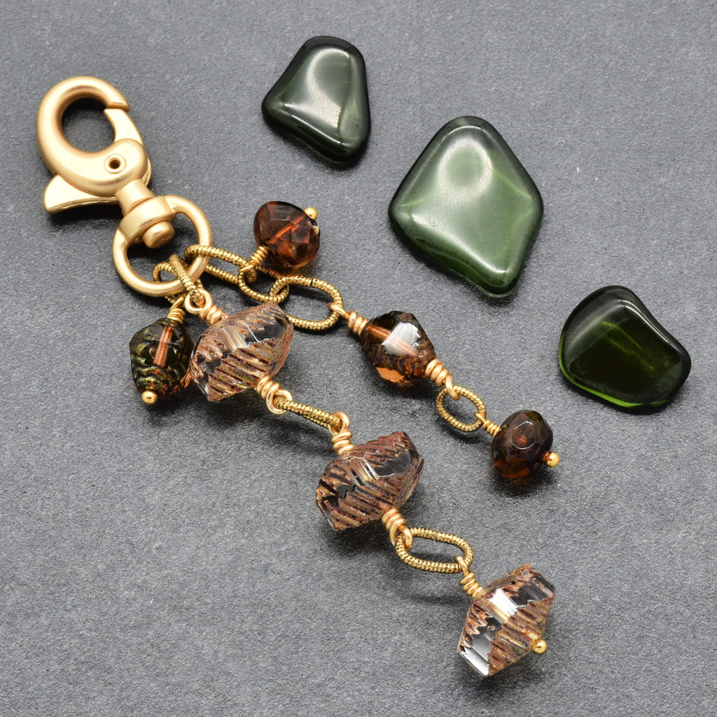 Smoky Reverie Handbag Charm featuring wire-wrapped etched Czech glass rondelles in smoky topaz with gold lobster claw, handmade by Ruby Acorn