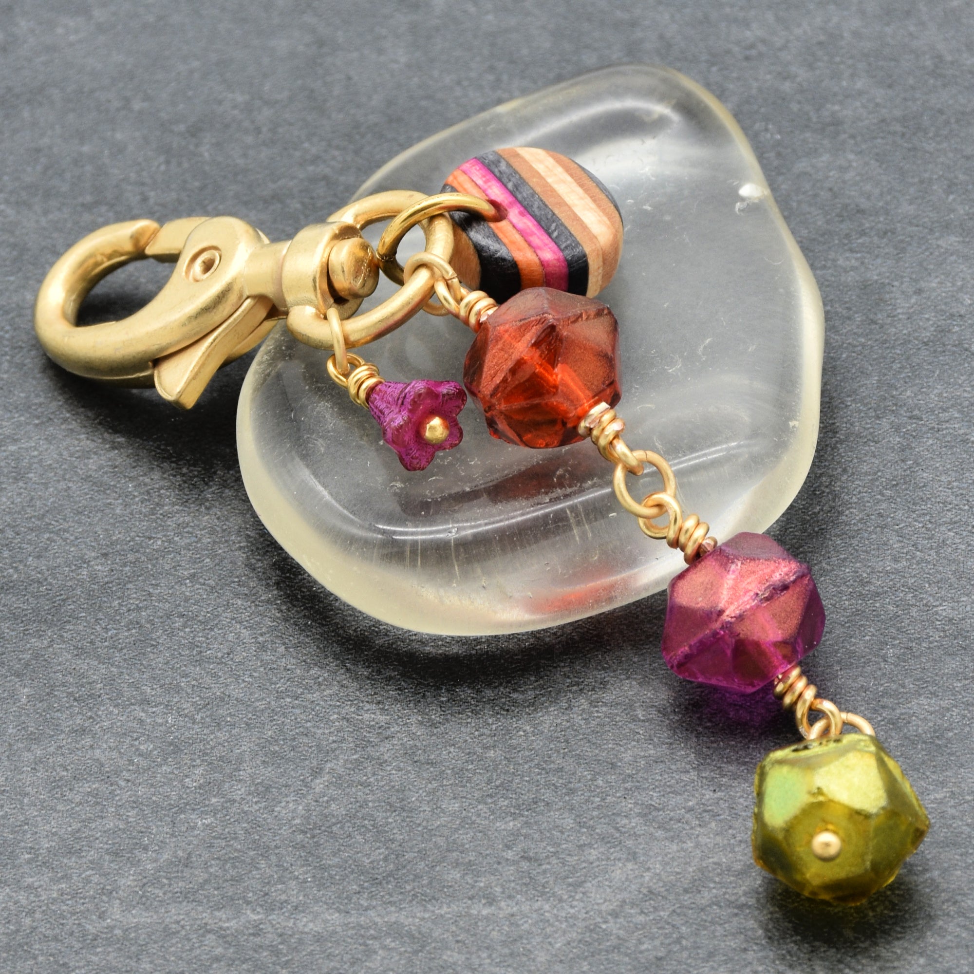 Jewelry keychain with neon colorful beads on a gray background - Ruby Acorn one of a kind art