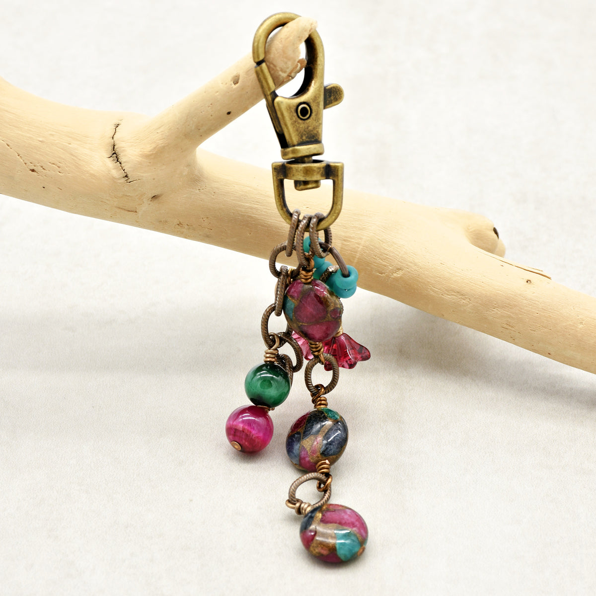 Mosaic in Bloom Handbag Charm featuring mosaic agate bead with fuchsia, turquoise and earth tones, handmade by Ruby Acorn
