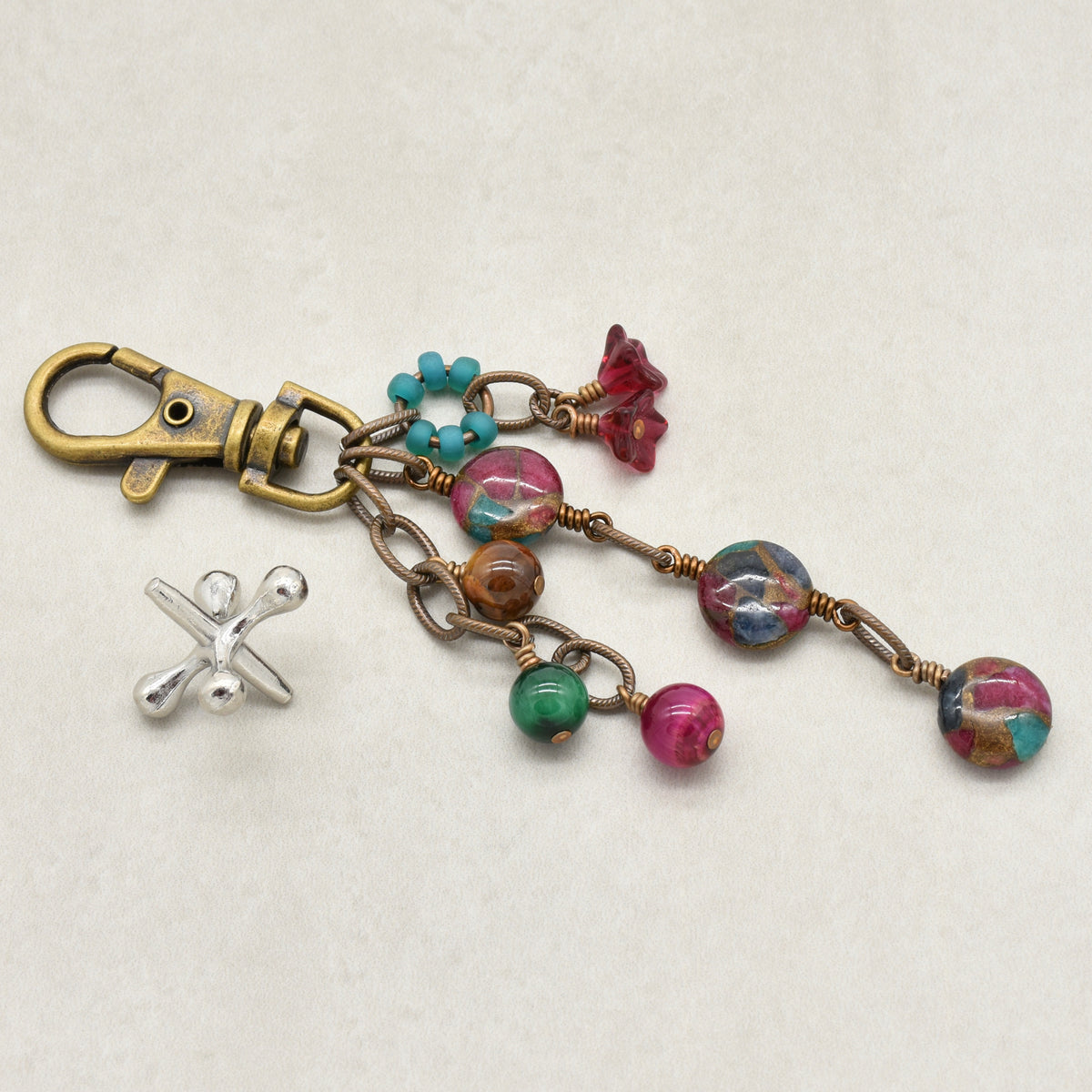 Mosaic in Bloom Handbag Charm featuring mosaic agate bead with fuchsia, turquoise and earth tones, handmade by Ruby Acorn