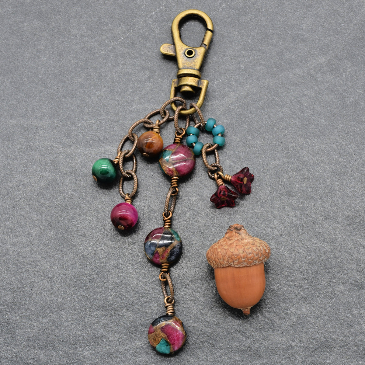 Mosaic in Bloom Handbag Charm featuring mosaic agate bead with fuchsia, turquoise and earth tones, handmade by Ruby Acorn