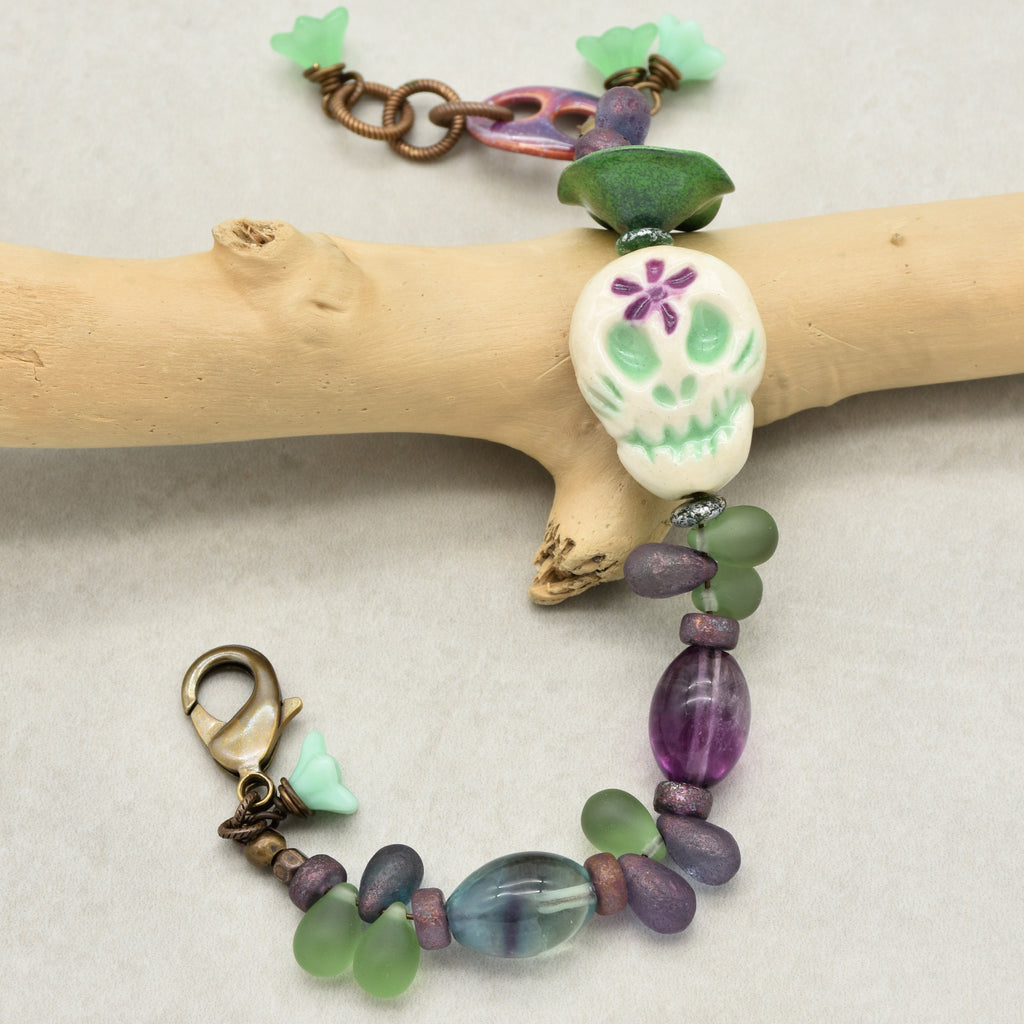 Fabulous Purple and Green Mardi Gras Catrina Handmade Beaded Bracelet with Artisan Ceramic Sugar Skull, Artisan Enameled Link and Rainbow Fluorite