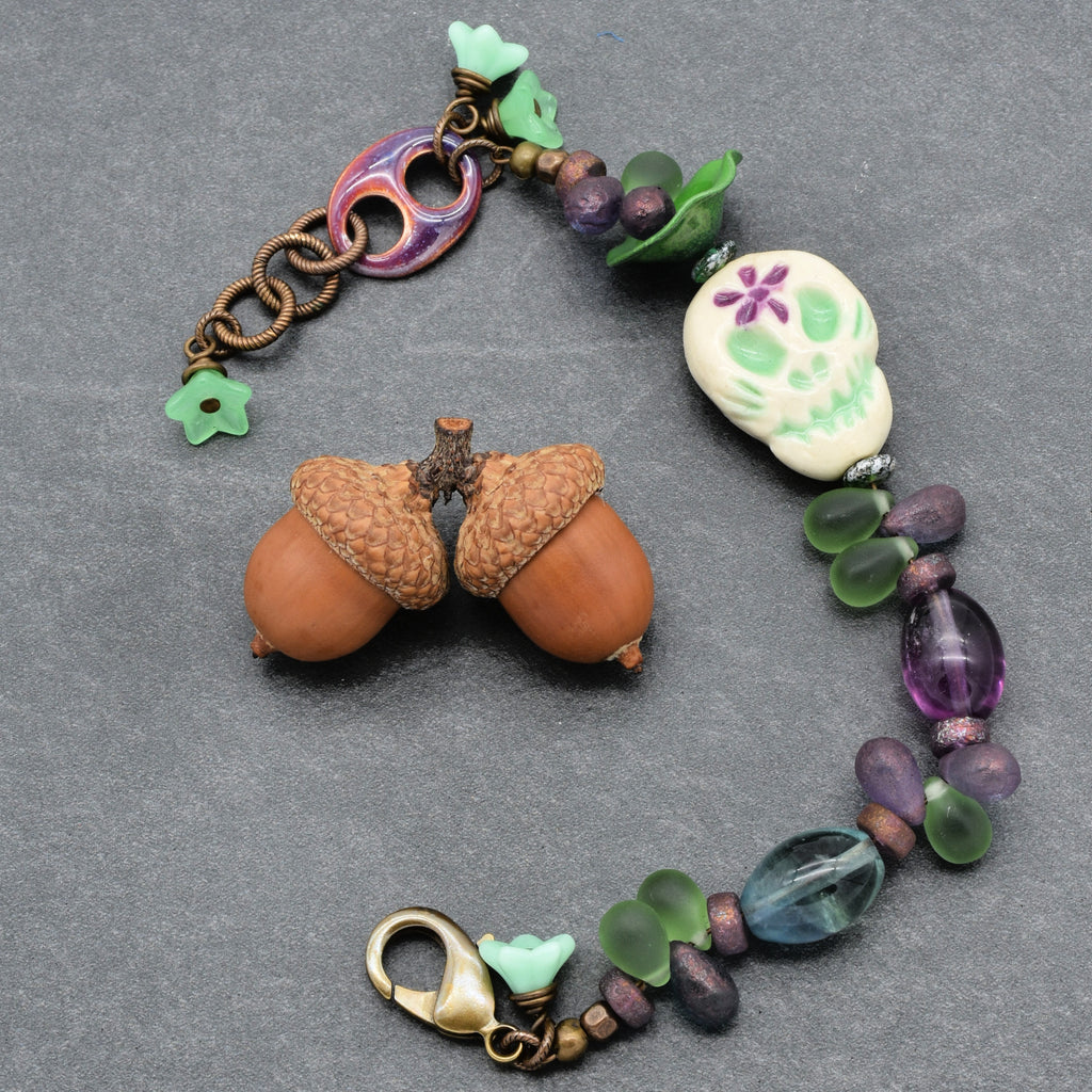 Fabulous Purple and Green Mardi Gras Catrina Handmade Beaded Bracelet with Artisan Ceramic Sugar Skull, Artisan Enameled Link and Rainbow Fluorite