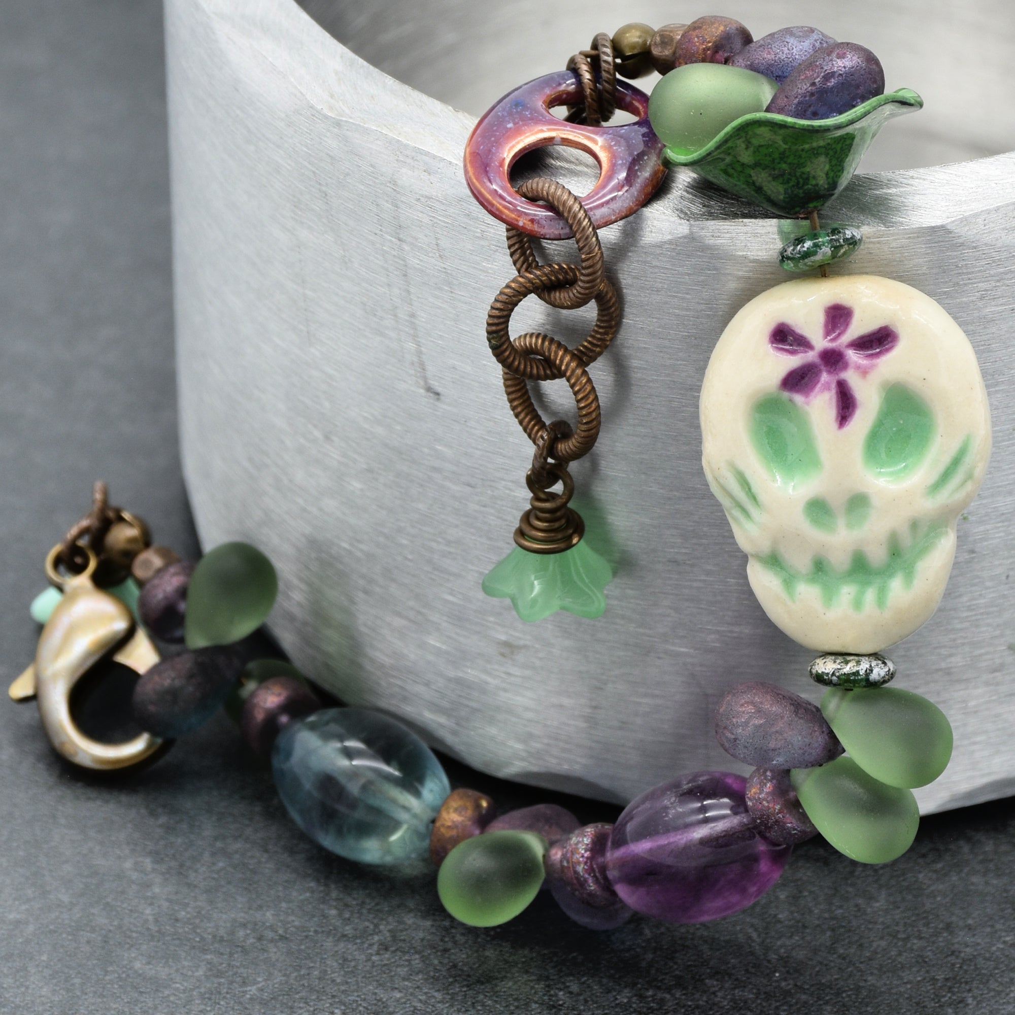 Fabulous Purple and Green Mardi Gras Catrina Handmade Beaded Bracelet with Artisan Ceramic Sugar Skull, Artisan Enameled Link and Rainbow Fluorite