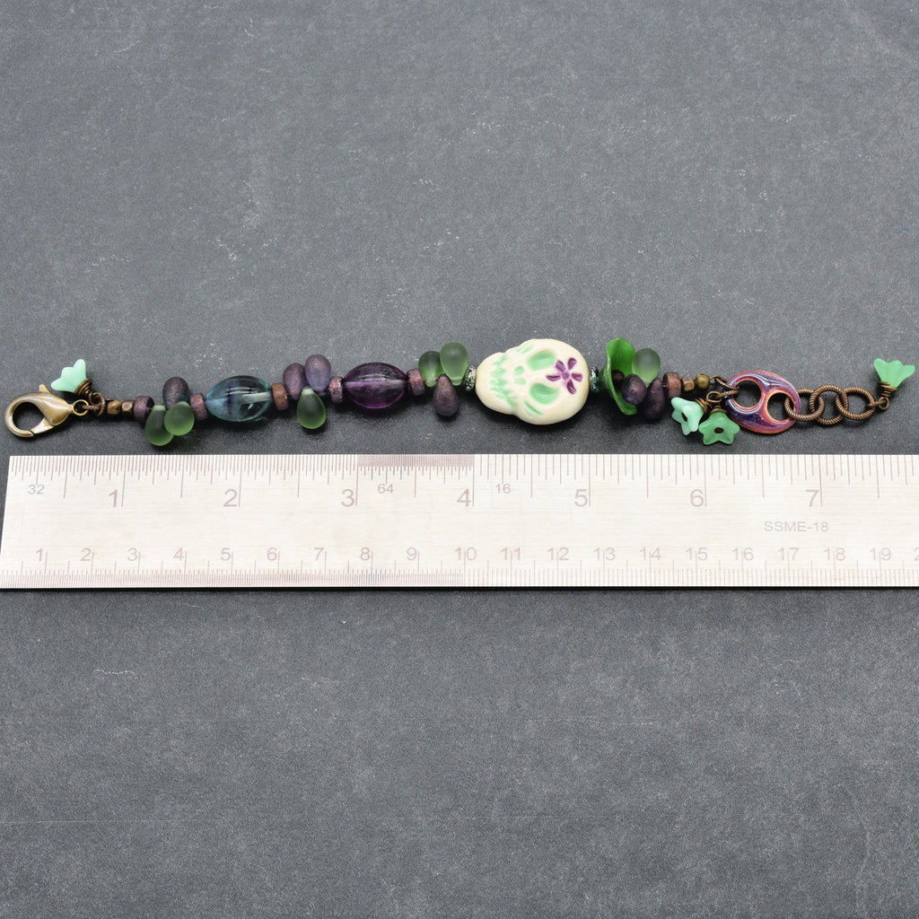 Fabulous Purple and Green Mardi Gras Catrina Handmade Beaded Bracelet with Artisan Ceramic Sugar Skull, Artisan Enameled Link and Rainbow Fluorite