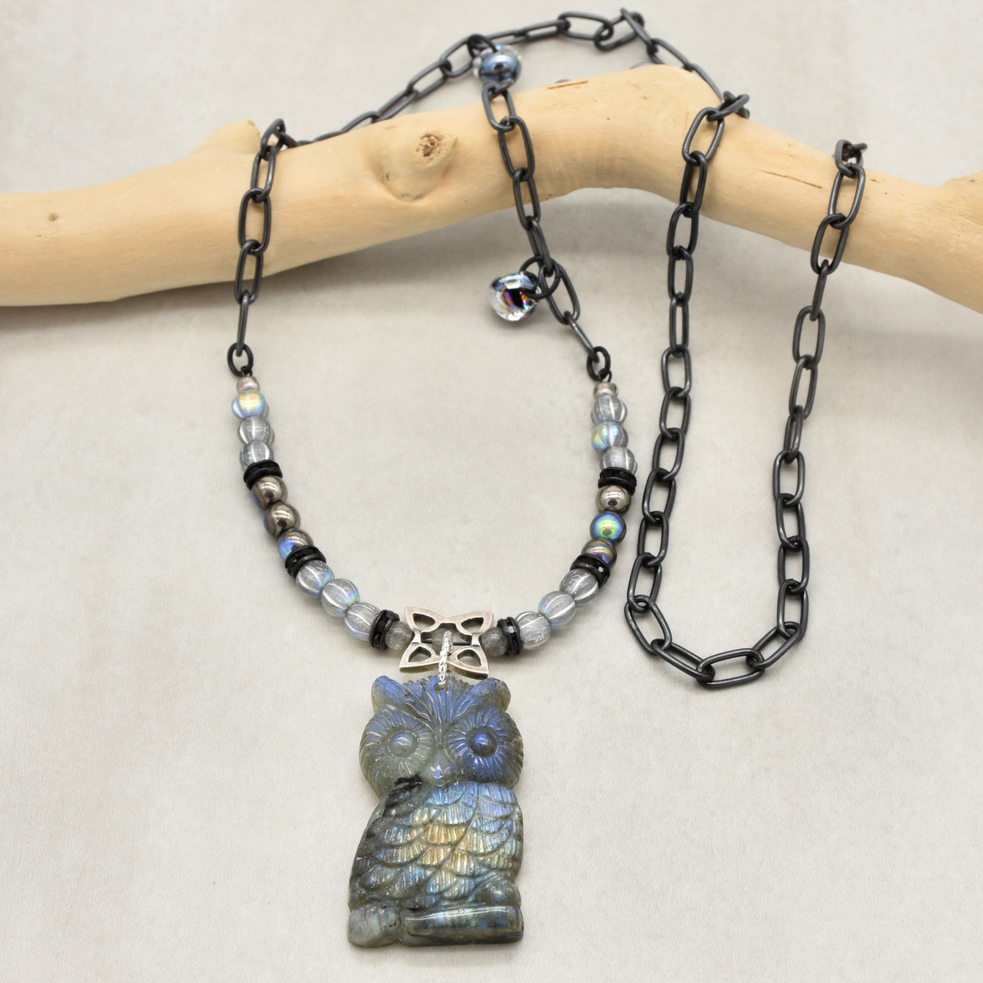 Necklace with labradorite carved owl focal, Czech glass and noir chain arranged on a branch - wearable art by Ruby Acorn