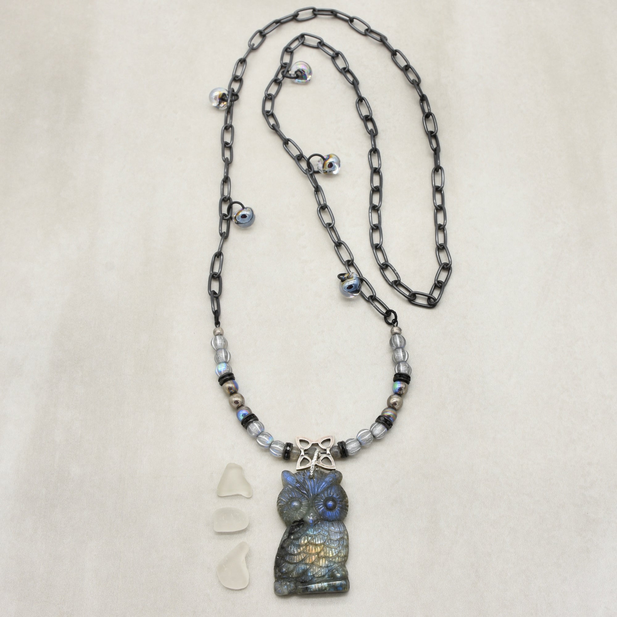 Longer necklace with a labradorite carved owl focal, Czech glass, noir chain - wearable art by Ruby Acorn