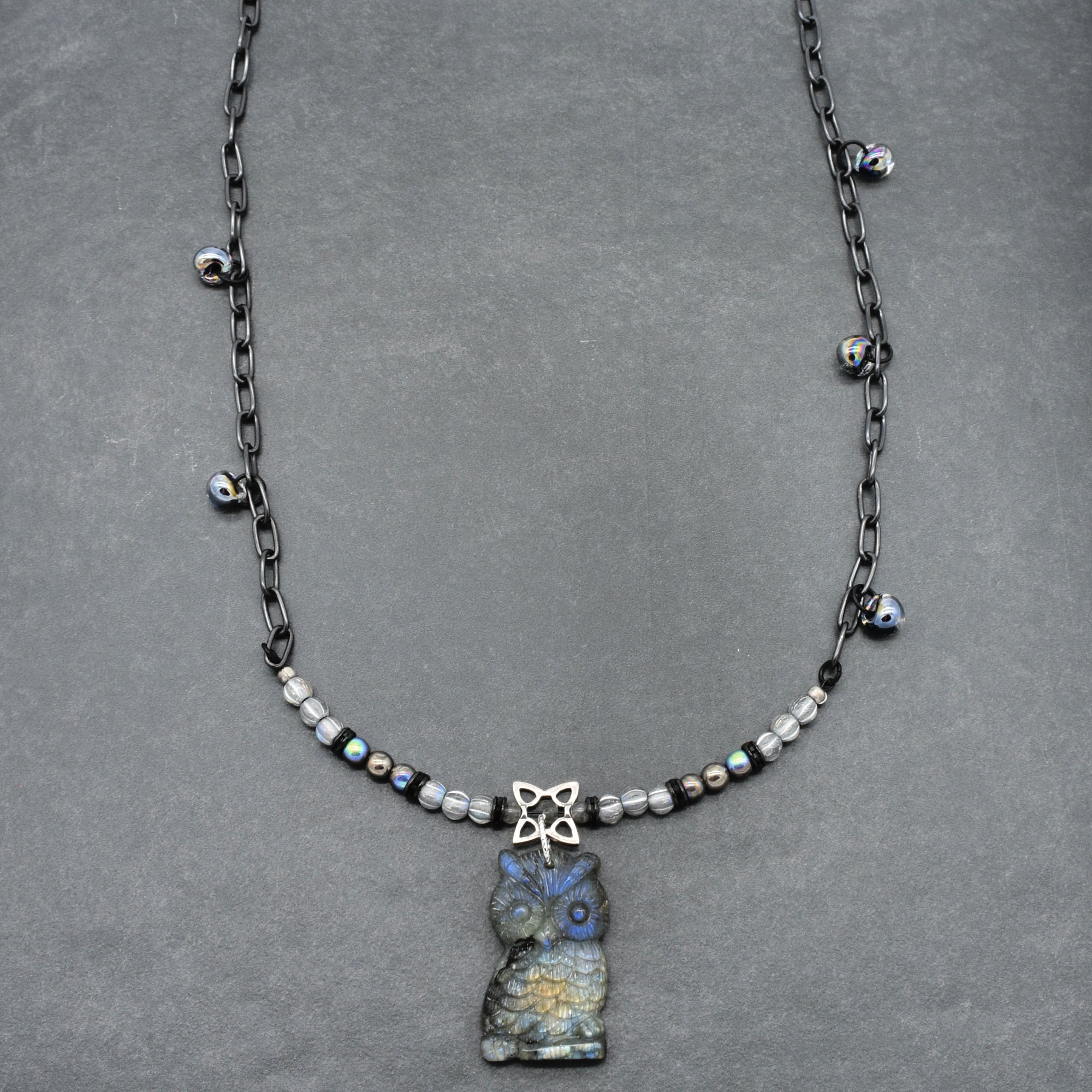 Hand crafted necklace with a labradorite carved owl focal, Czech glass, and noir chain - one of a kind wearable art by Ruby Acorn