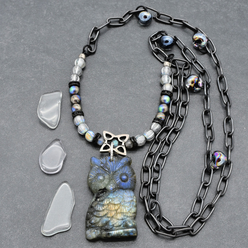 Close up of a necklace with a labradorite carved owl focal, Czech glass and noir chain - art you can wear by Ruby Acorn