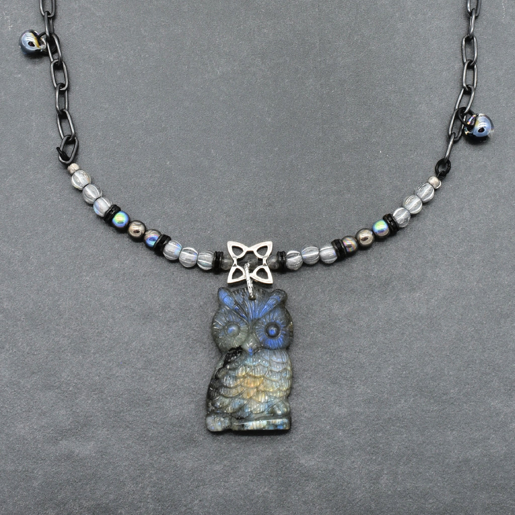 Close up of a necklace with a labradorite carved owl focal, Czech glass and noir chain - made with love in Colorado by Ruby Acorn