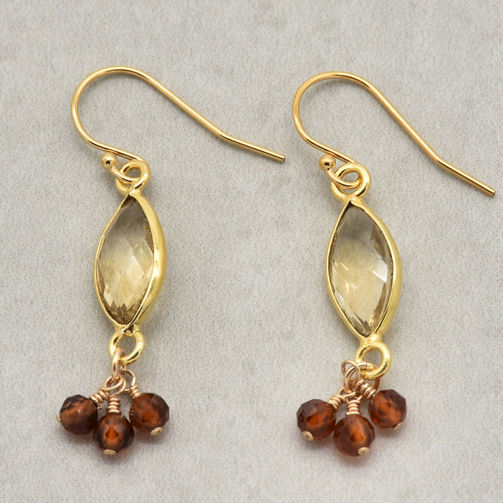 Sol Spice Earrings featuring citrine vermeil wrapped links and natural hessonite garnet rounds, handmade by Ruby Acorn