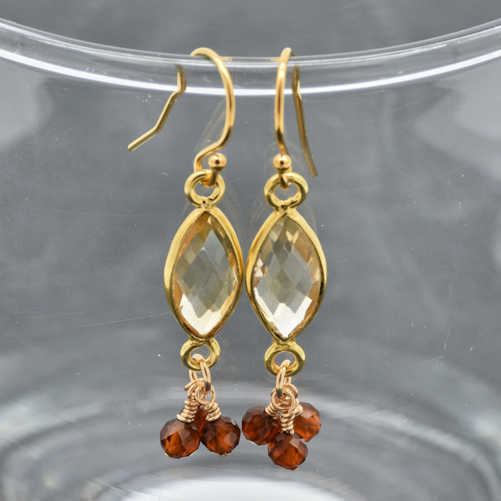 Sol Spice Earrings featuring citrine vermeil wrapped links and natural hessonite garnet rounds, handmade by Ruby Acorn