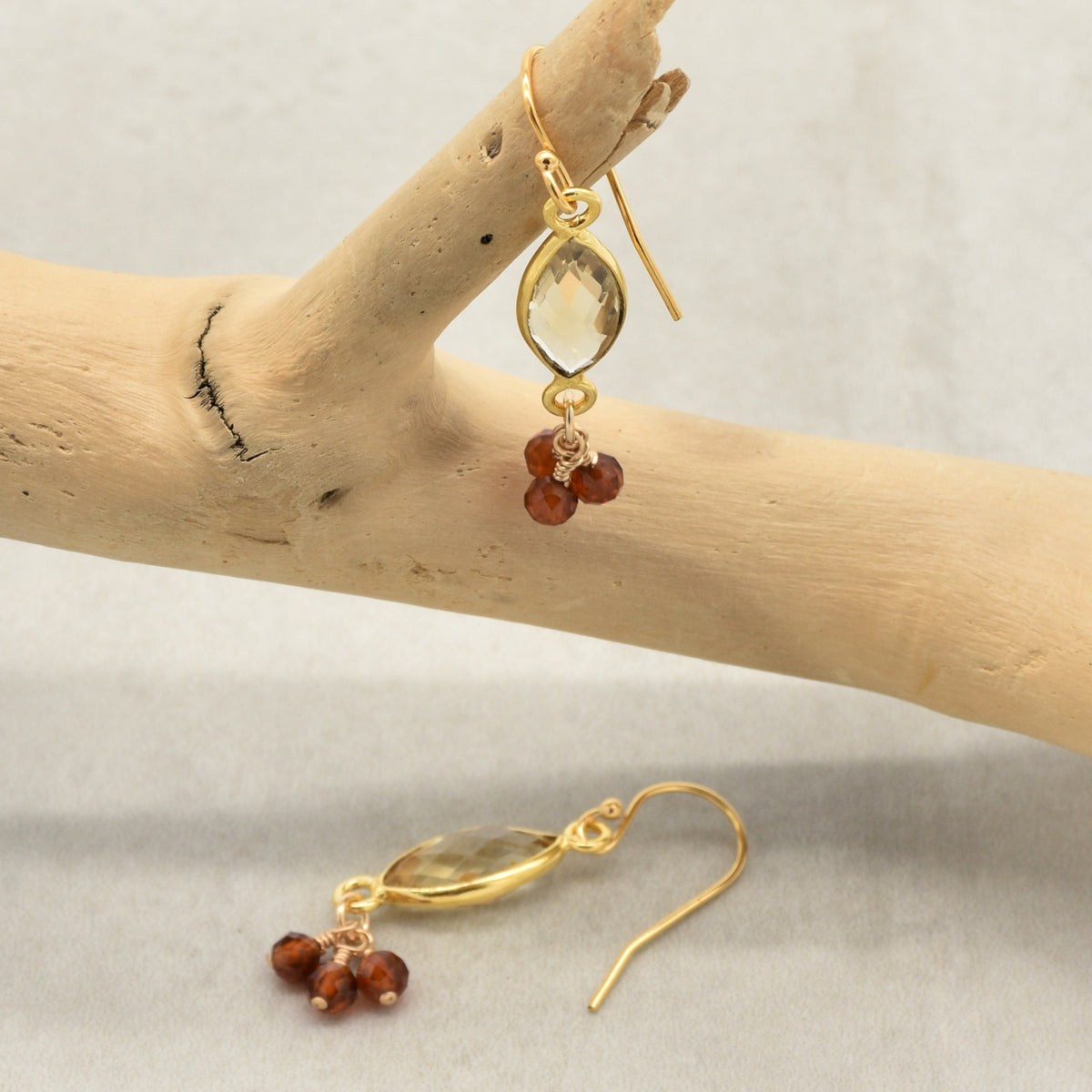 Sol Spice Earrings featuring citrine vermeil wrapped links and natural hessonite garnet rounds, handmade by Ruby Acorn