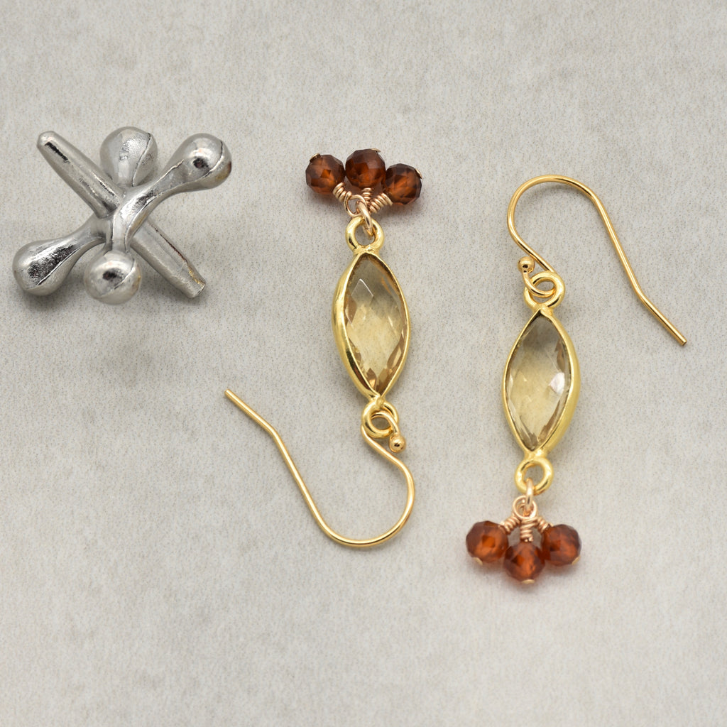 Sol Spice Earrings featuring citrine vermeil wrapped links and natural hessonite garnet rounds, handmade by Ruby Acorn