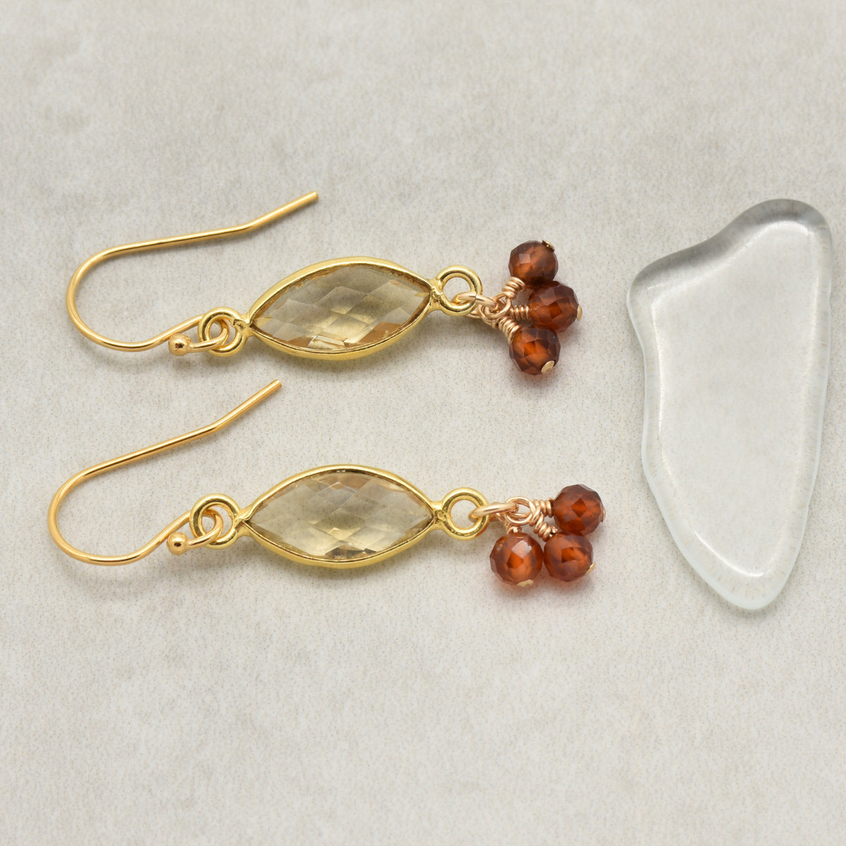 Sol Spice Earrings featuring citrine vermeil wrapped links and natural hessonite garnet rounds, handmade by Ruby Acorn