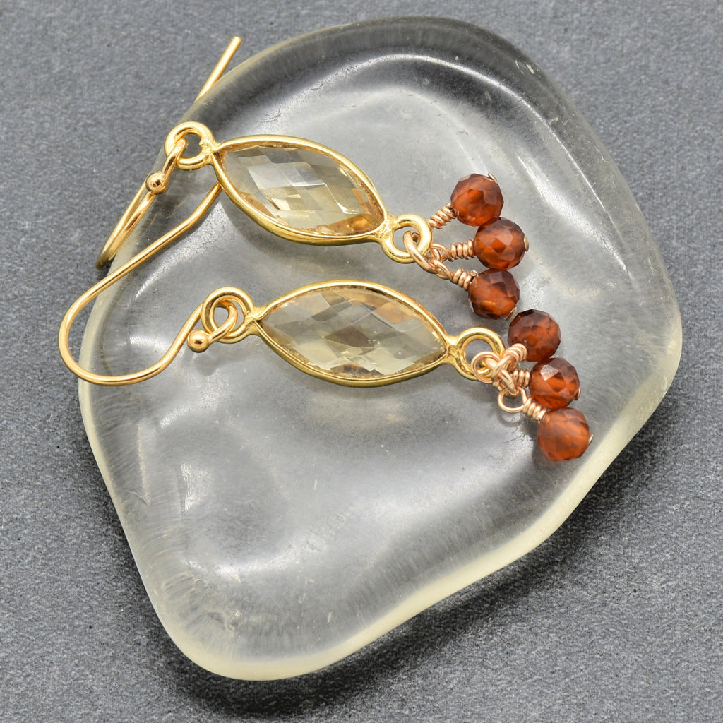 Sol Spice Earrings featuring citrine vermeil wrapped links and natural hessonite garnet rounds, handmade by Ruby Acorn