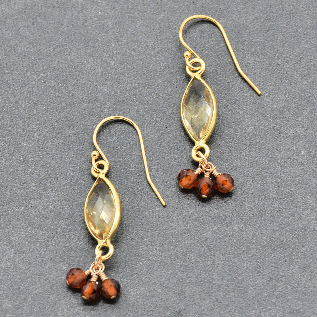 Sol Spice Earrings featuring citrine vermeil wrapped links and natural hessonite garnet rounds, handmade by Ruby Acorn