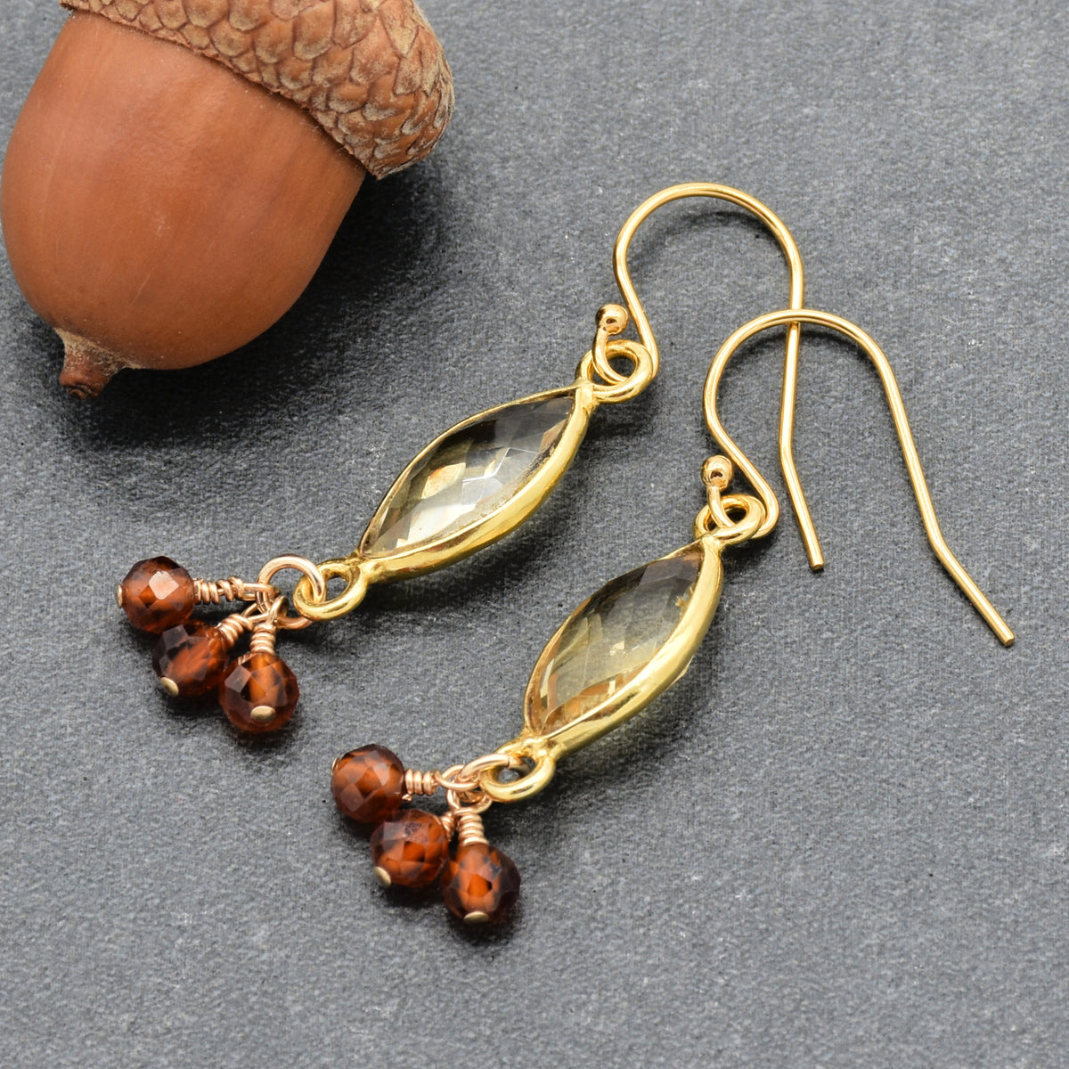 Sol Spice Earrings featuring citrine vermeil wrapped links and natural hessonite garnet rounds, handmade by Ruby Acorn