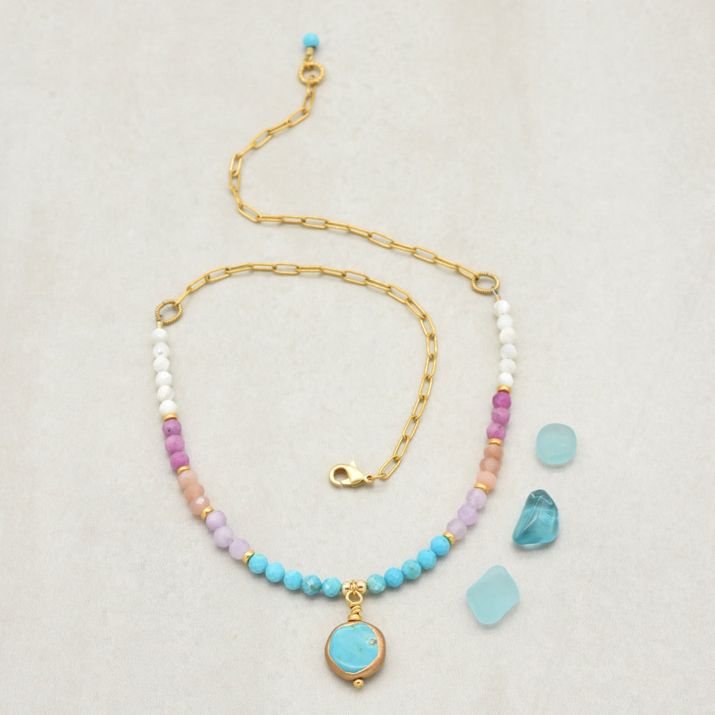 Multi gem gold chain choker necklace with genuine turquoise focal, kunzite, peach moonstone, and more on a light background - made with love by Ruby Acorn