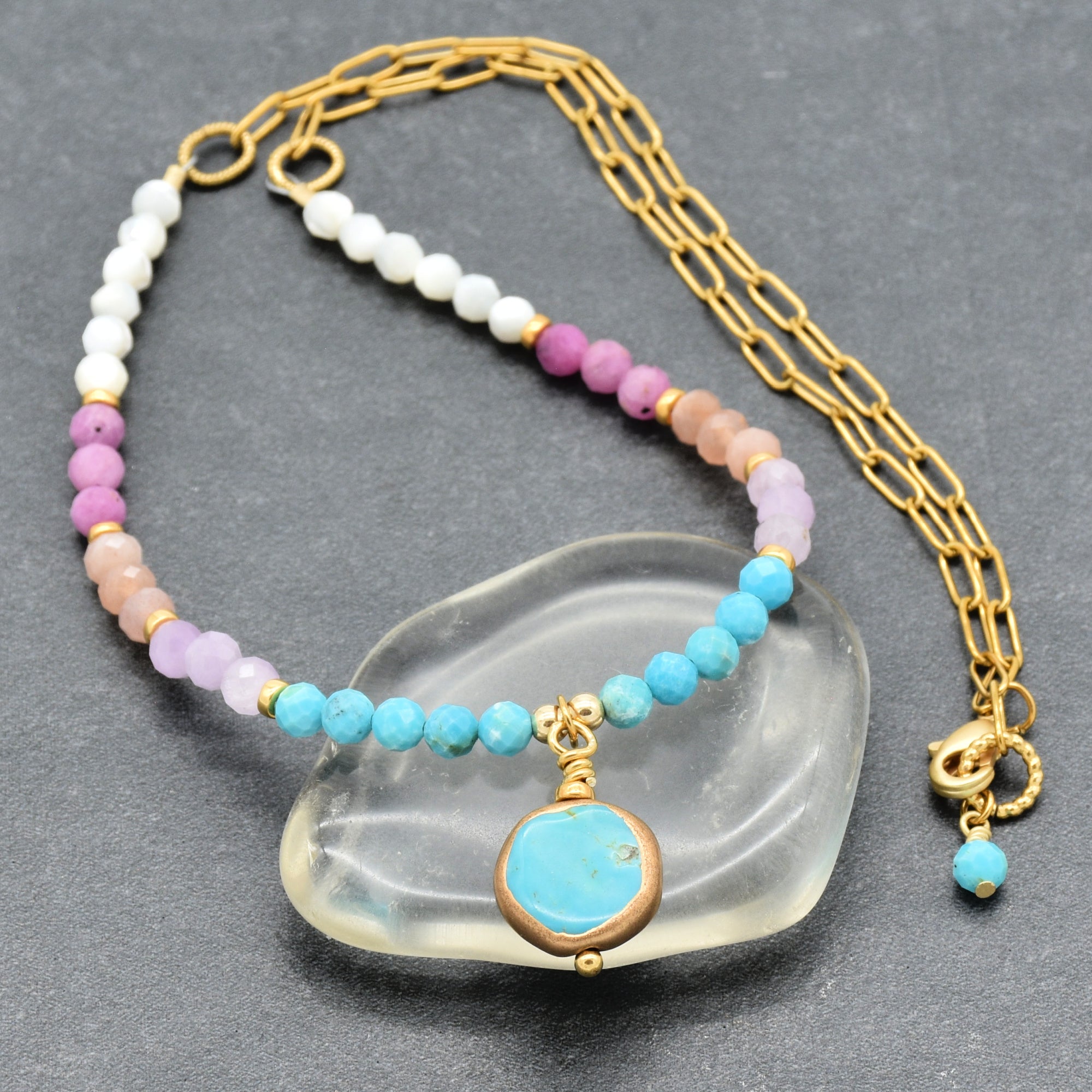 Multi gem gold chain choker necklace with genuine turquoise focal, kunzite, peach moonstone, and more on a gray background - made with love by Ruby Acorn