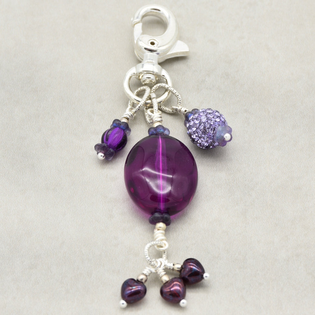 Violet Purple handbag charm with Lucite, pave and Czech glass hearts on a light background - handmade with love by Ruby Acorn