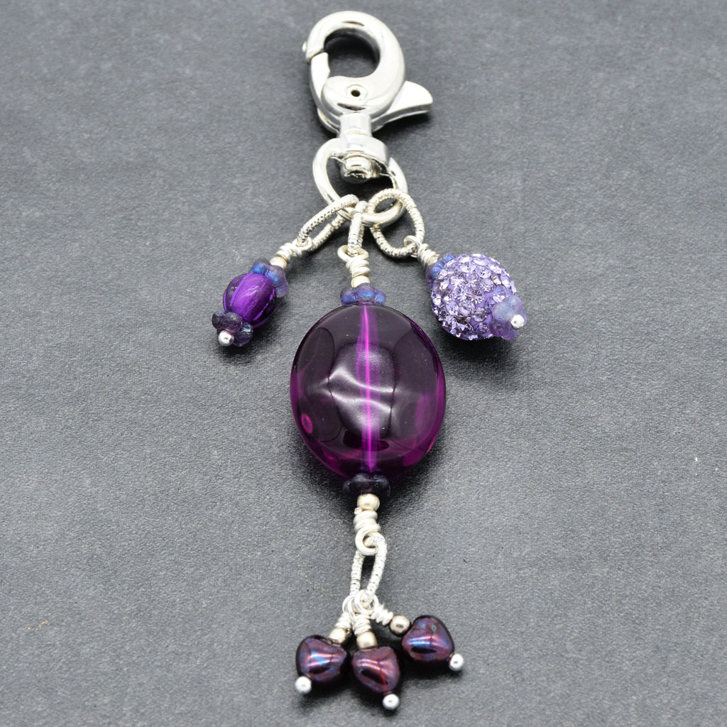 Violet Purple handbag charm with Lucite, pave and Czech glass hearts on a gray background - handmade with love by Ruby Acorn