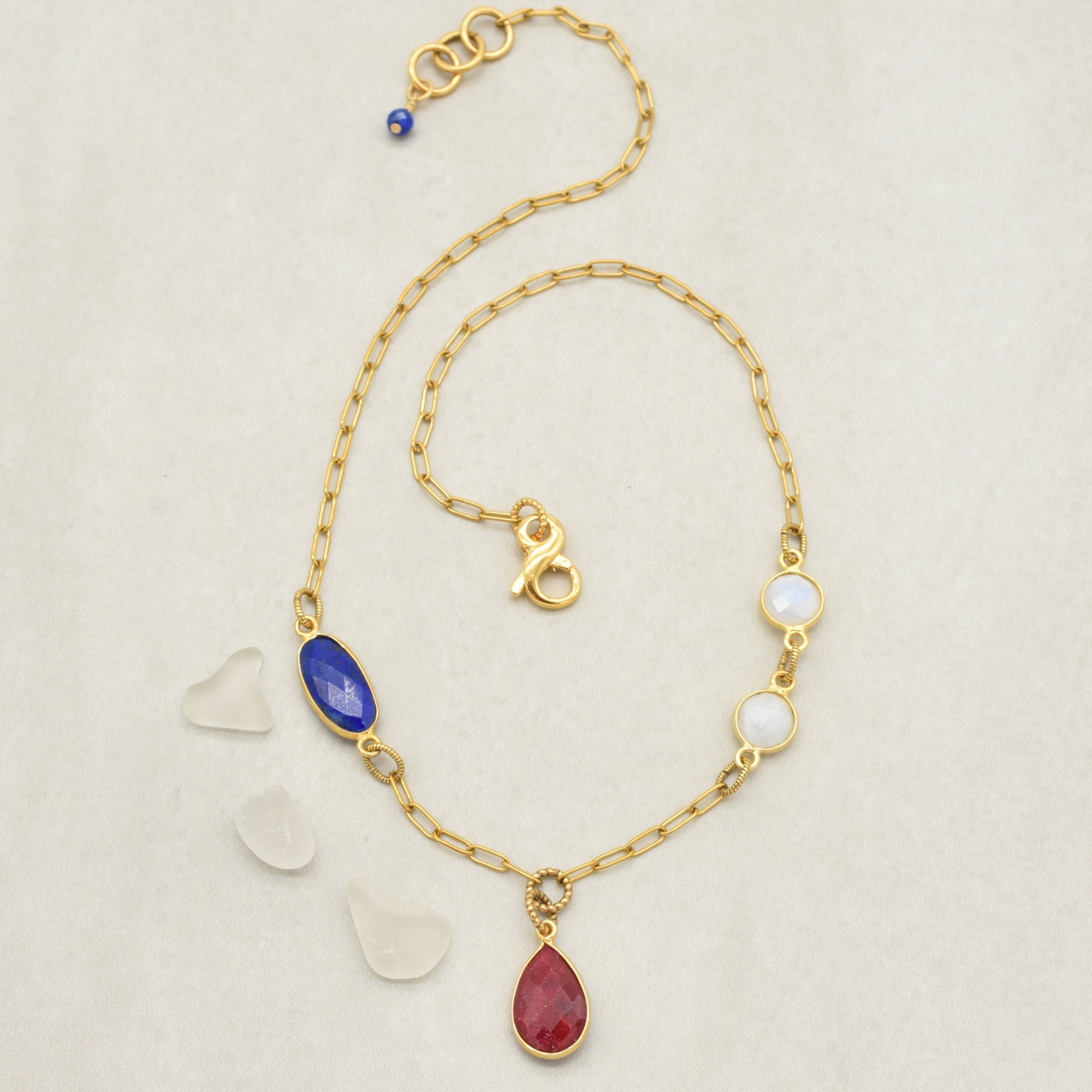 Asymmetrical necklace with delicate gold chain, lapis, ruby and rainbow moonstone - Red, White and Blue wearable art handmade by Ruby Acorn