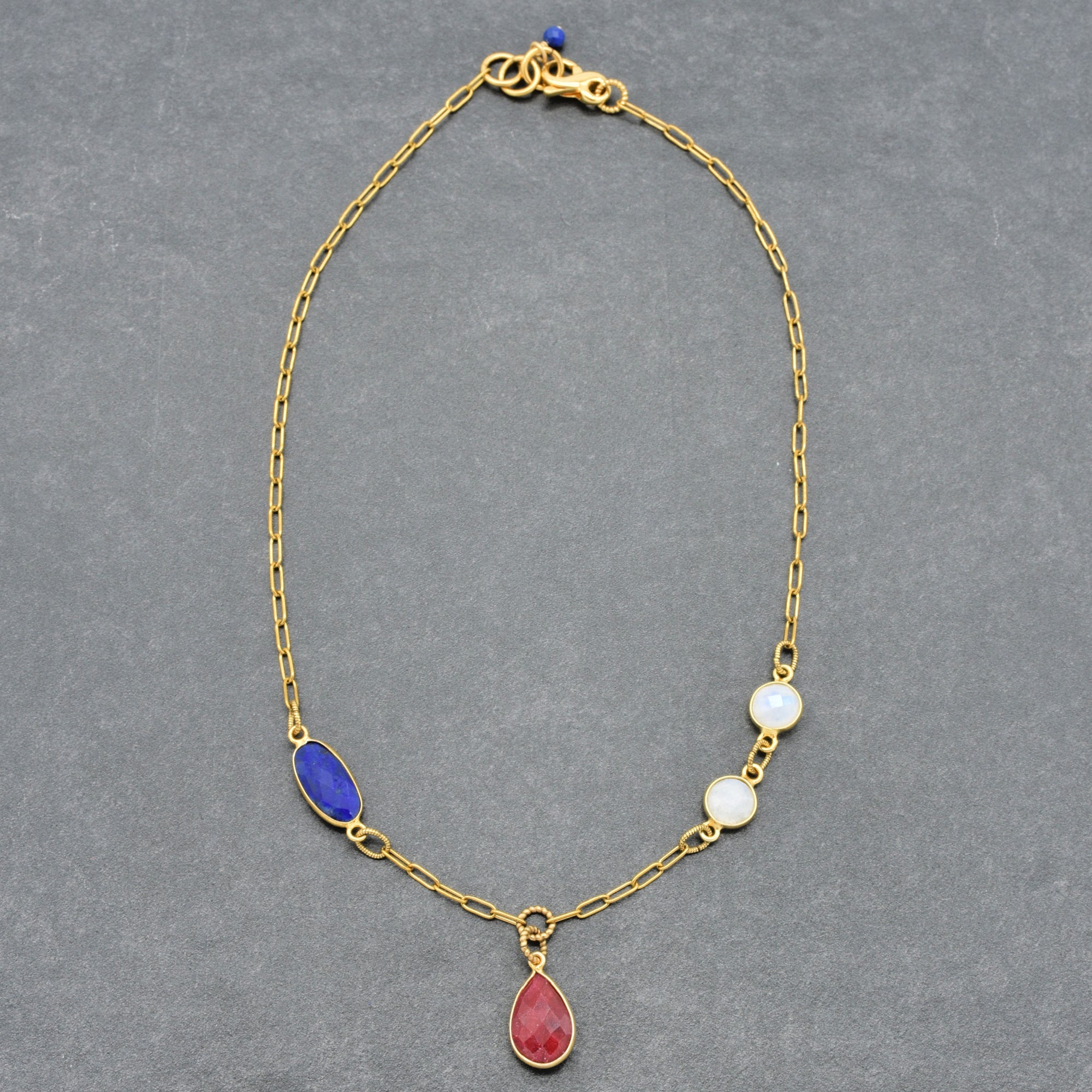 Ruby, lapis and rainbow moonstone gold chain necklace with an infinity lobster claw - wearable art by Ruby Acorn.