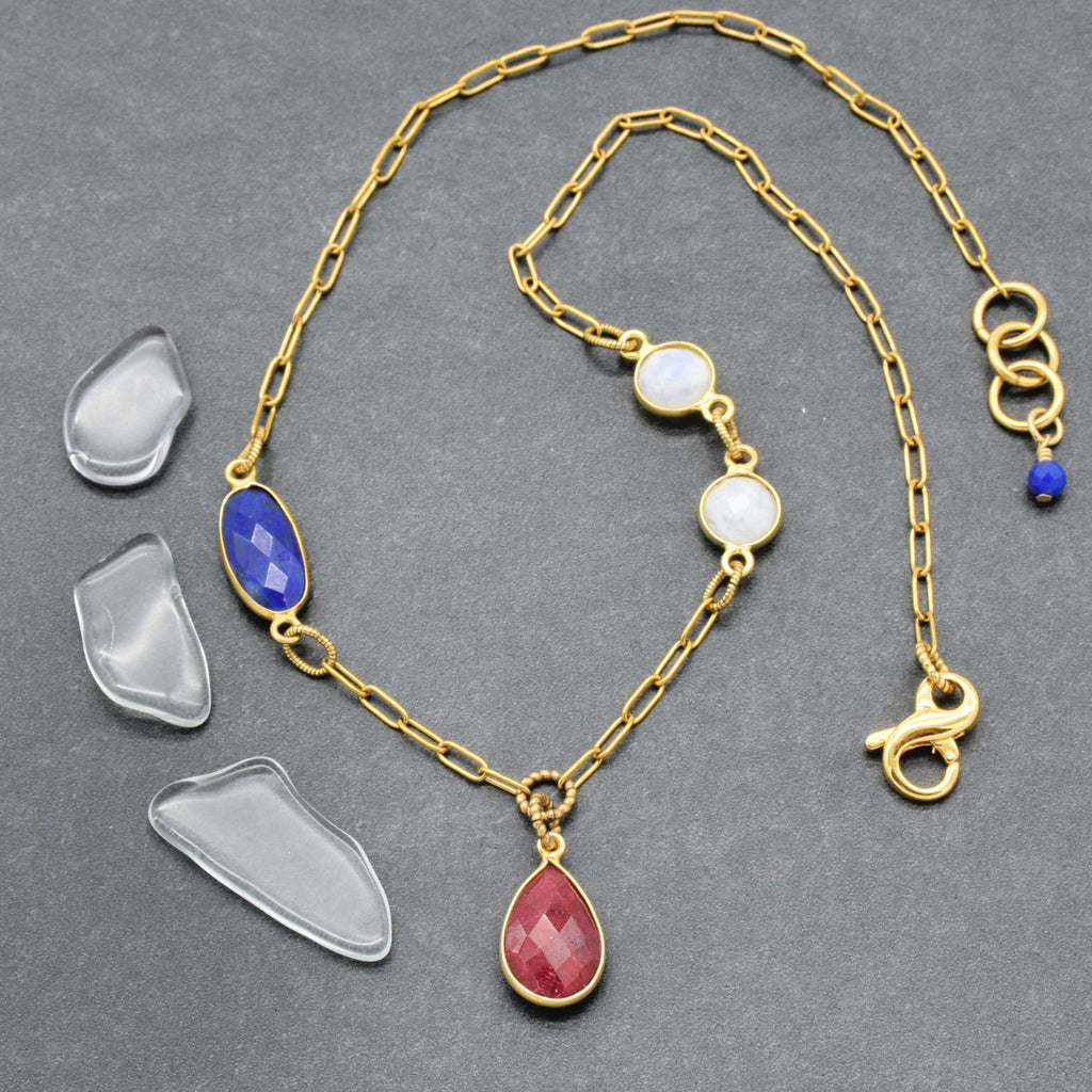Whimsical choker necklace with delicate gold chain, ruby pendant and lapis and rainbow moonstone links - art you can wear by Ruby Acorn