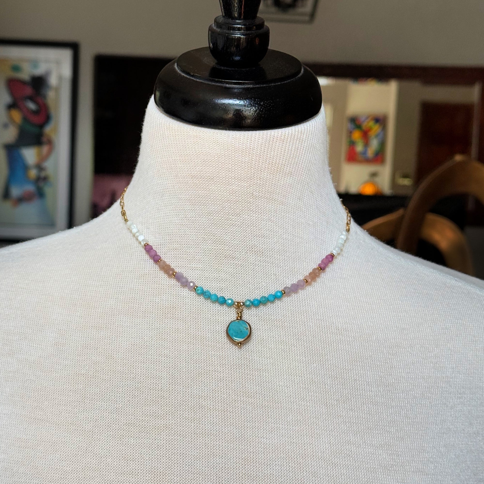Multi gem gold chain choker necklace with genuine turquoise focal, kunzite, peach moonstone, and more on a mannequin - made with love by Ruby Acorn