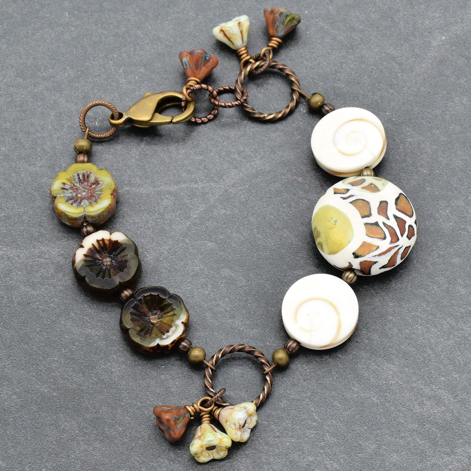 Swanky Safari Handmade Beaded Bracelet with Artisan Polymer Clay Green Giraffe Focal, Shell, Czech Glass Flowers