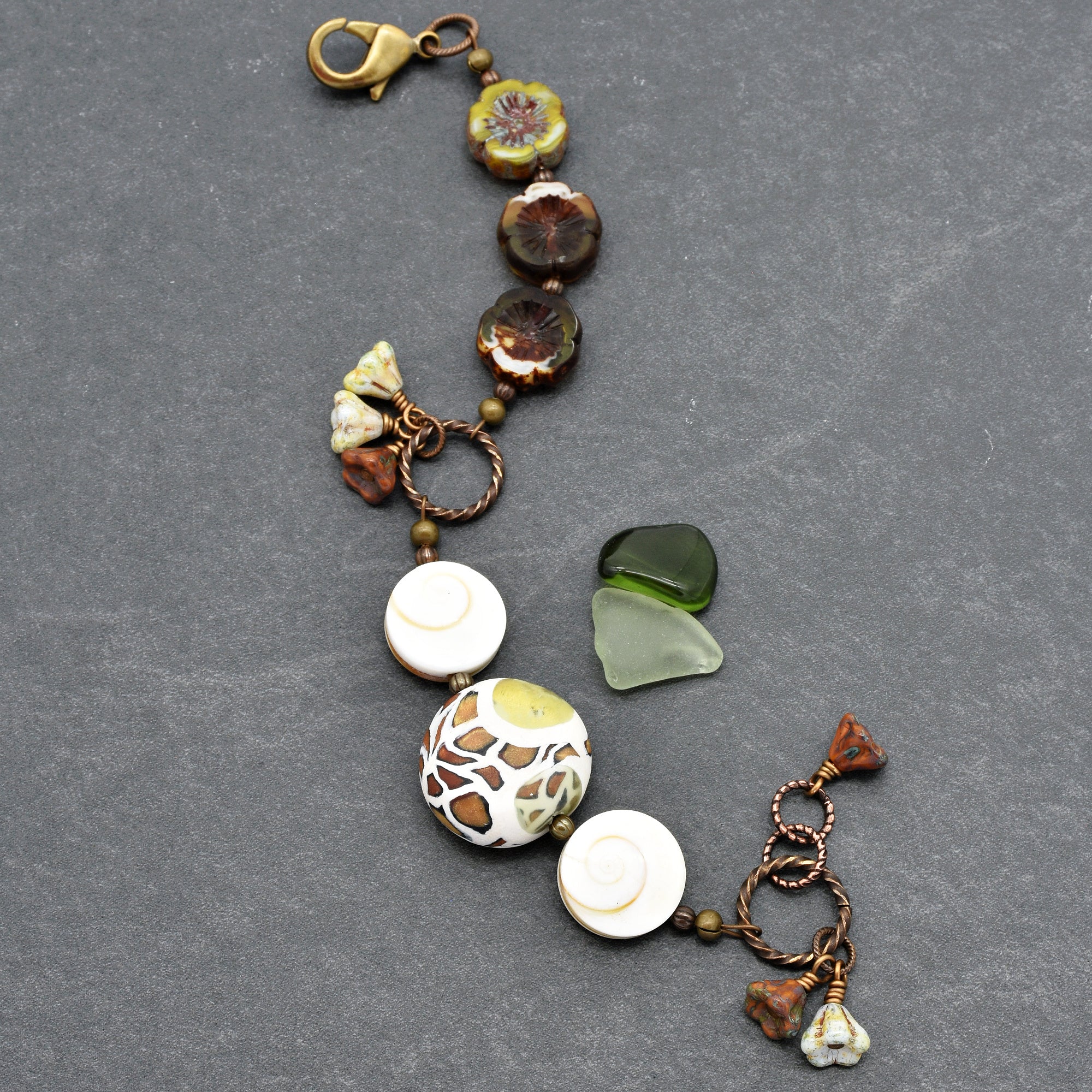 Swanky Safari Handmade Beaded Bracelet with Artisan Polymer Clay Green Giraffe Focal, Shell, Czech Glass Flowers