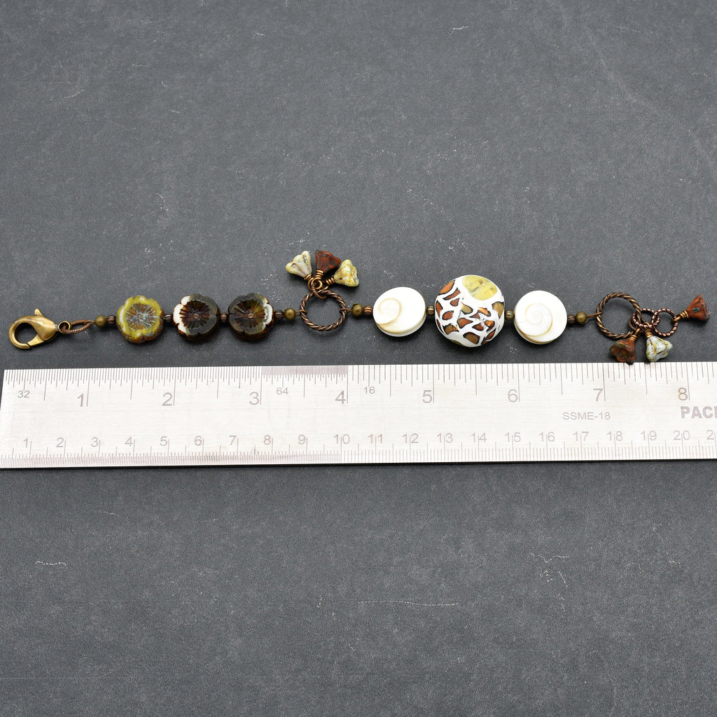 Swanky Safari Handmade Beaded Bracelet with Artisan Polymer Clay Green Giraffe Focal, Shell, Czech Glass Flowers