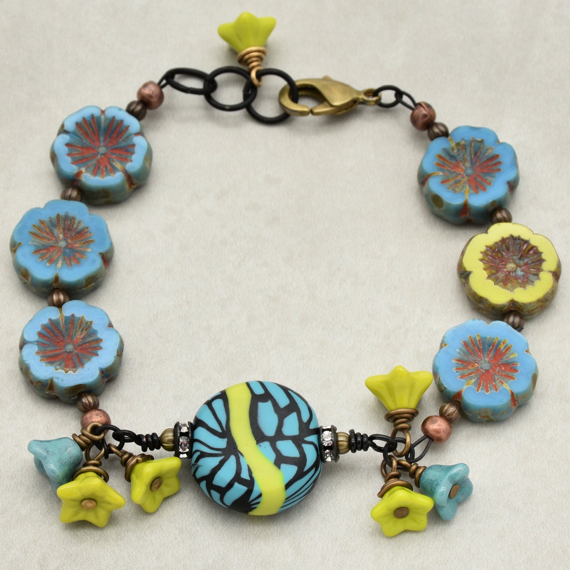 Tribal Turquoise Handmade Beaded Bracelet with Artisan Polymer Clay Lime Green and Turquoise Focal and Czech Glass Flowers