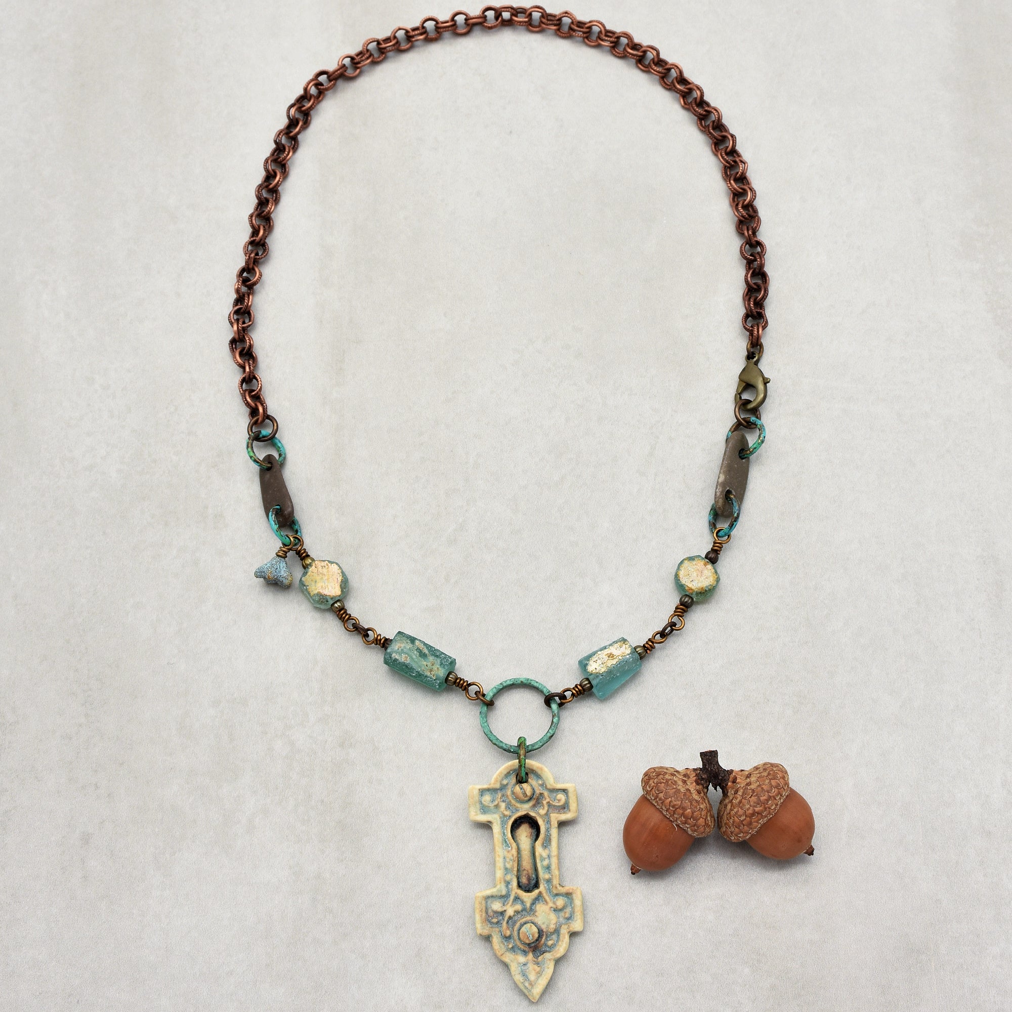 Roman Glass Verdigris Handmade Necklace with Artisan Porcelain Focal, Beach Stones, Roman Glass