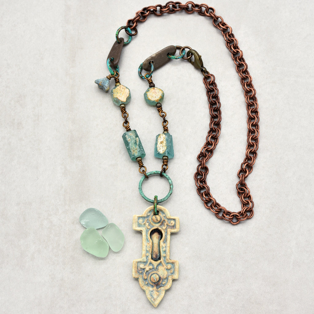 Roman Glass Verdigris Handmade Necklace with Artisan Porcelain Focal, Beach Stones, Roman Glass